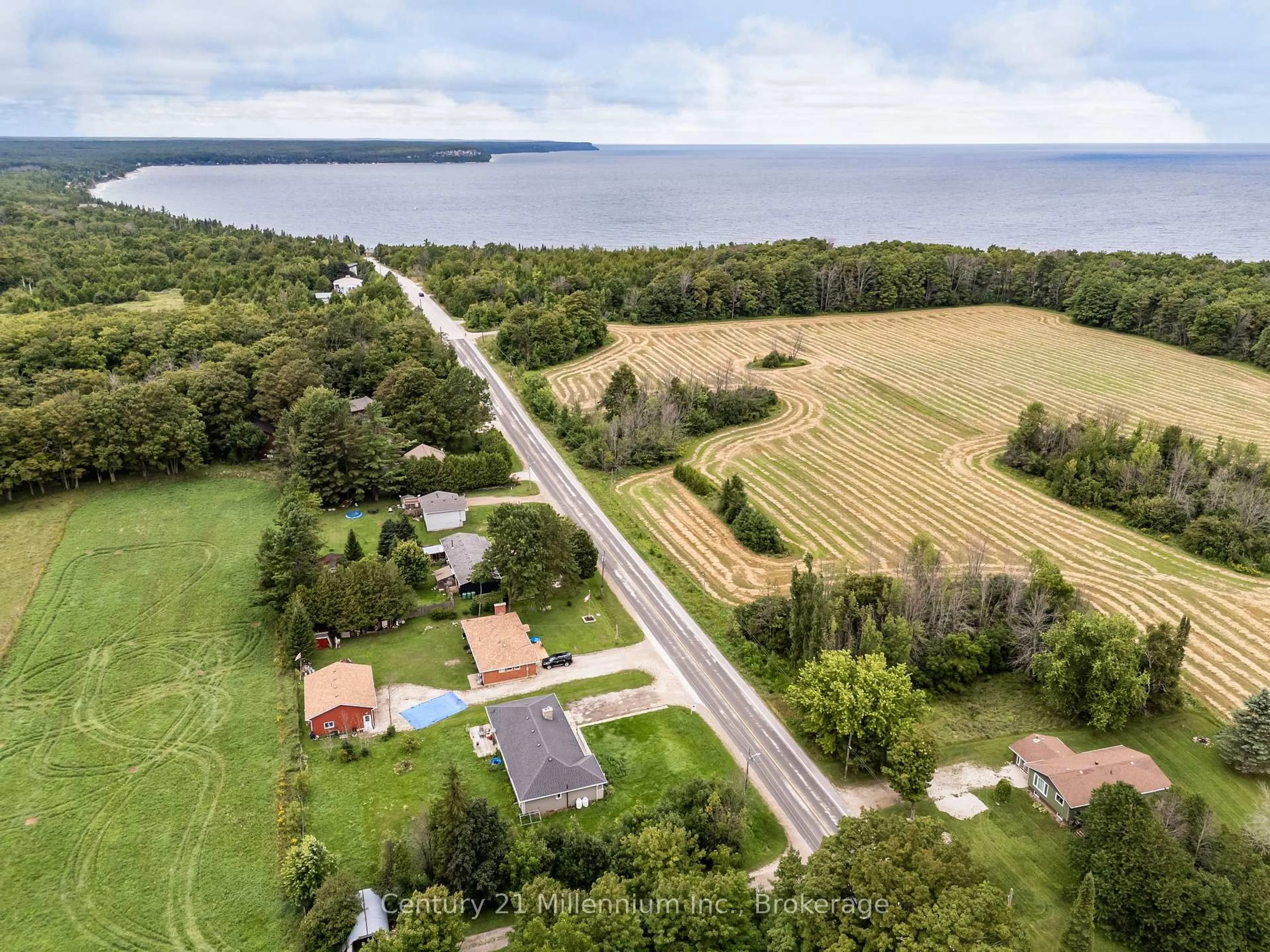 A pic from outside/outdoor area/front of a property/back of a property/a pic from drone, water/lake/river/ocean view for 130 MAIN St, Northern Bruce Peninsula Ontario N0H 1W0