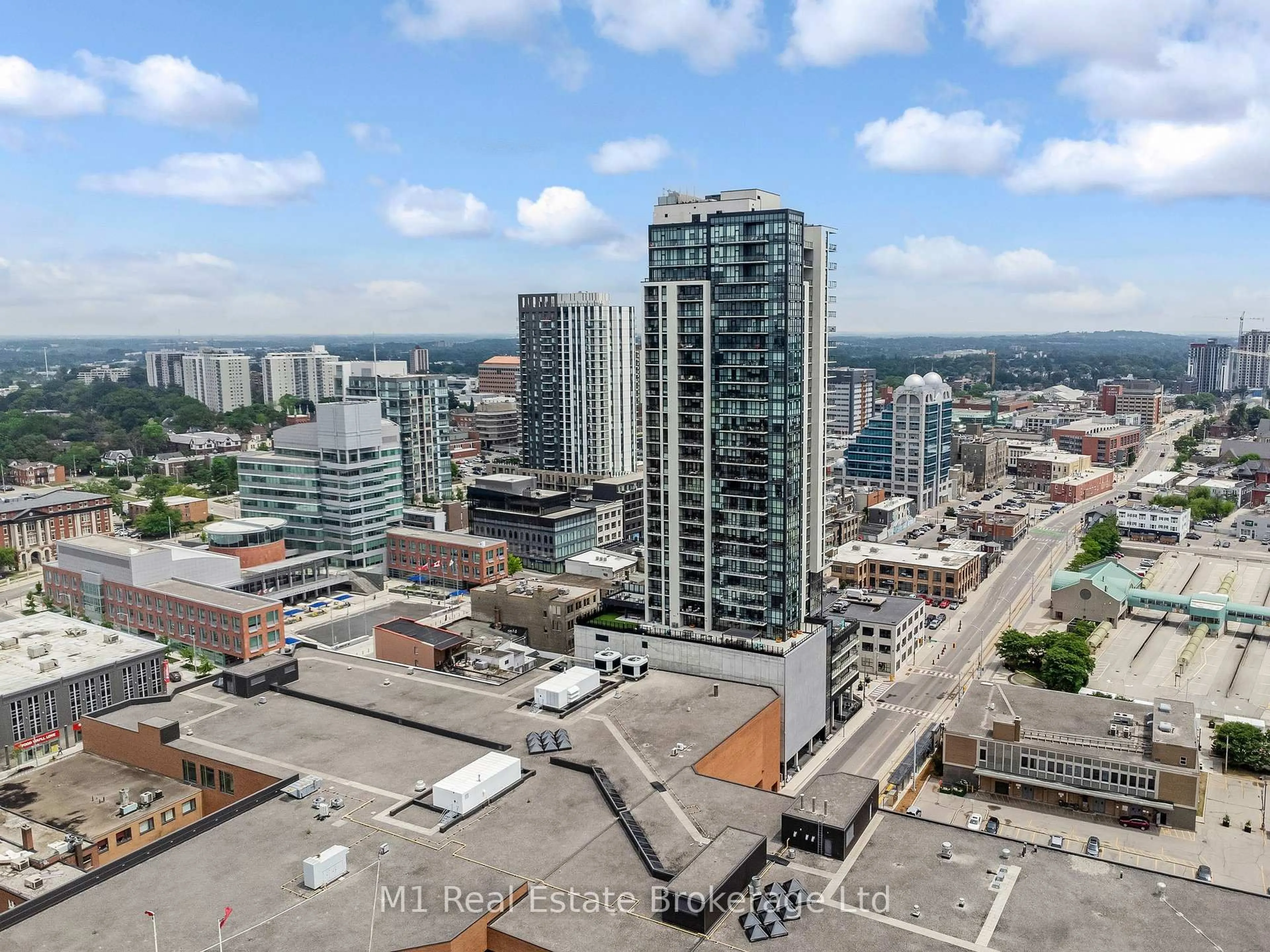 A pic from outside/outdoor area/front of a property/back of a property/a pic from drone, city buildings view from balcony for 60 Charles St #3001, Kitchener Ontario N2G 0C9