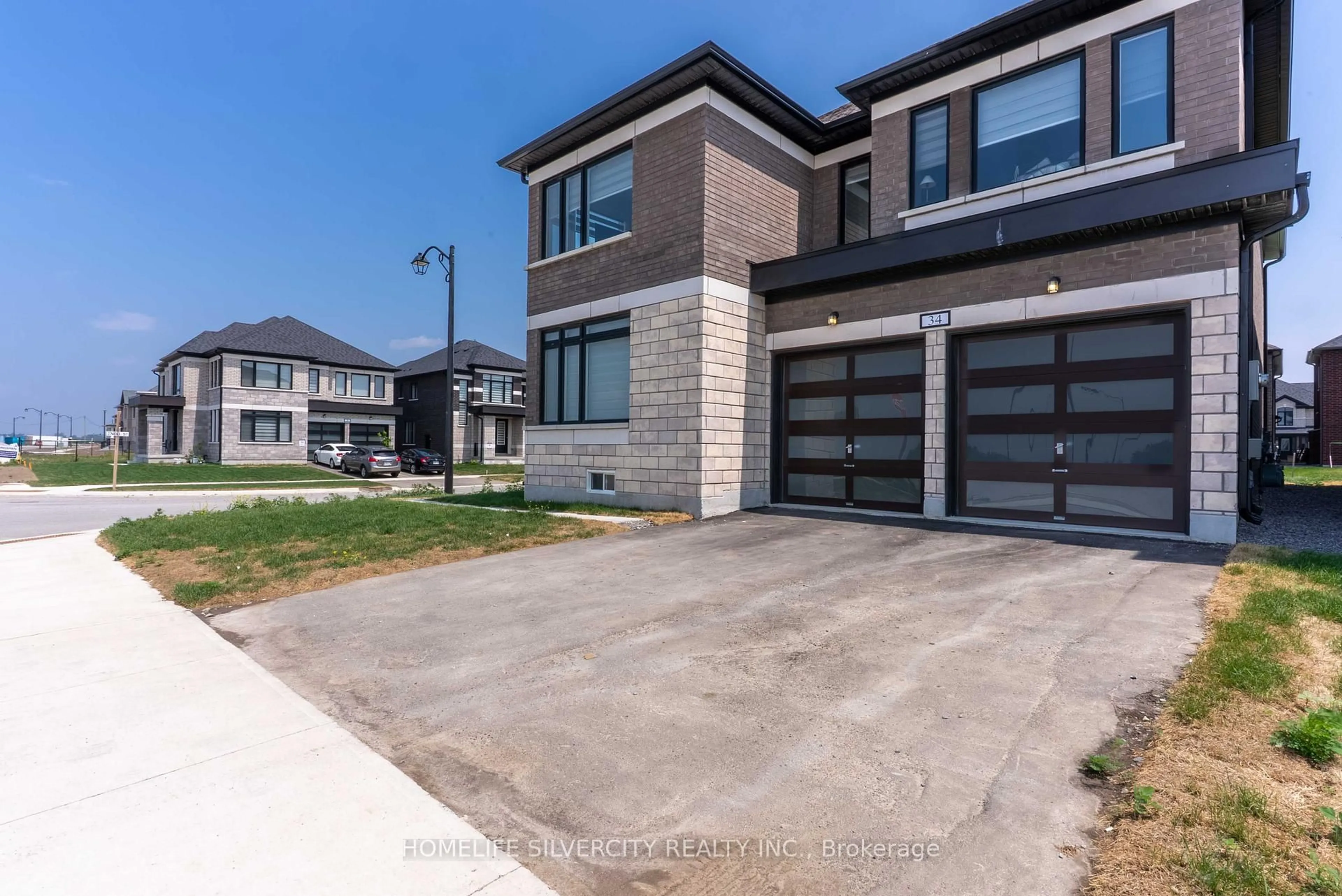 Home with brick exterior material, street for 34 Mckay Ave, Kawartha Lakes Ontario K9V 0R2