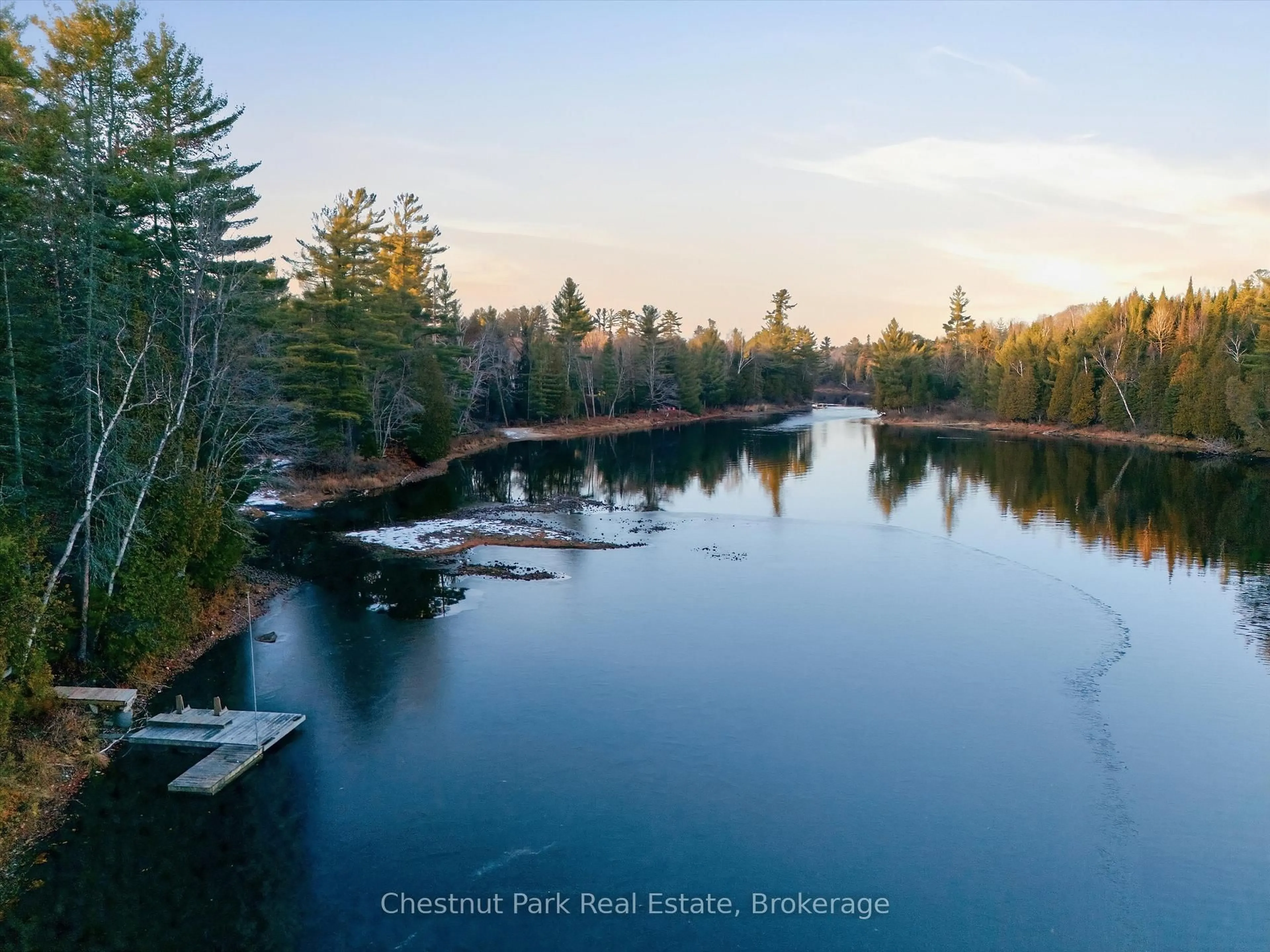 A pic from outside/outdoor area/front of a property/back of a property/a pic from drone, water/lake/river/ocean view for 1077 Fairy Falls Rd, Lake of Bays Ontario P0B 1A0