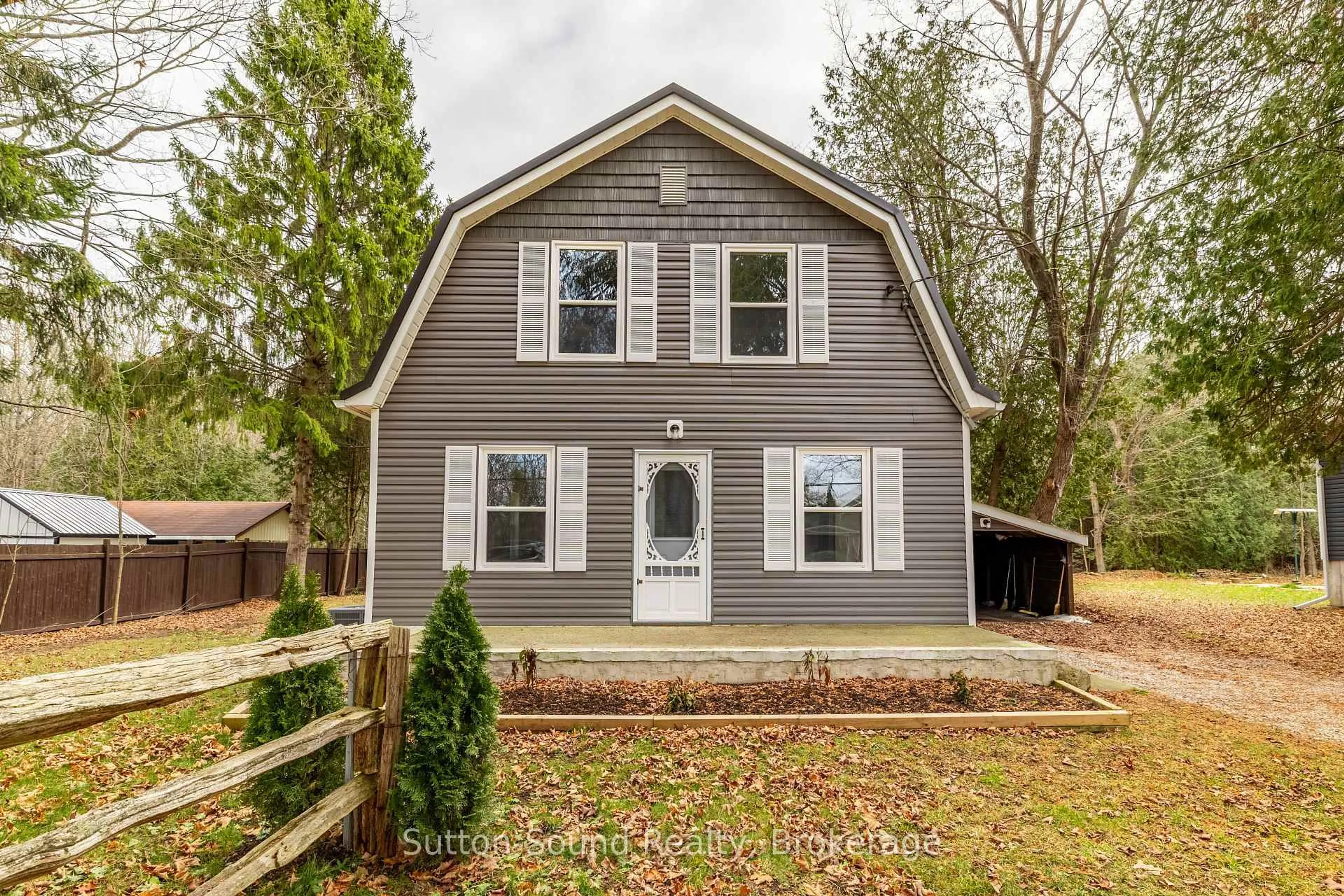 Home with vinyl exterior material, street for 318777 Grey Road 1 Rd, Georgian Bluffs Ontario N4K 5N4