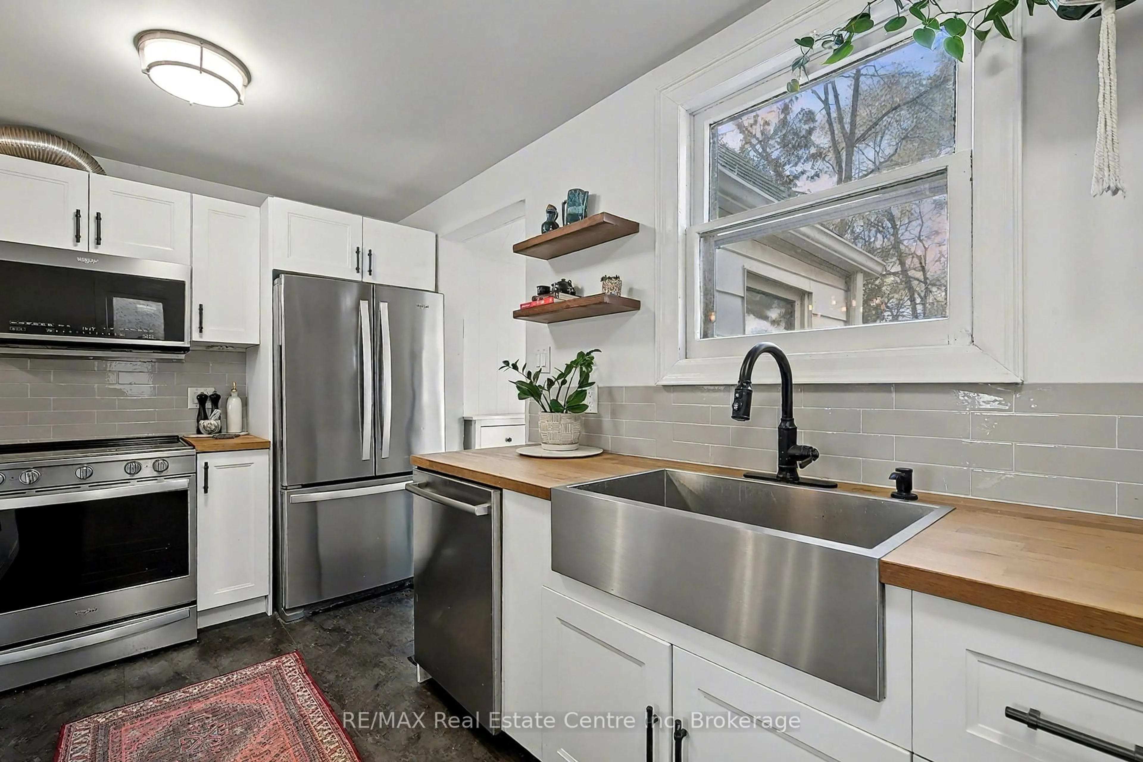 Open concept kitchen, ceramic/tile floor for 217 Victoria Rd, Guelph Ontario N1E 5P9