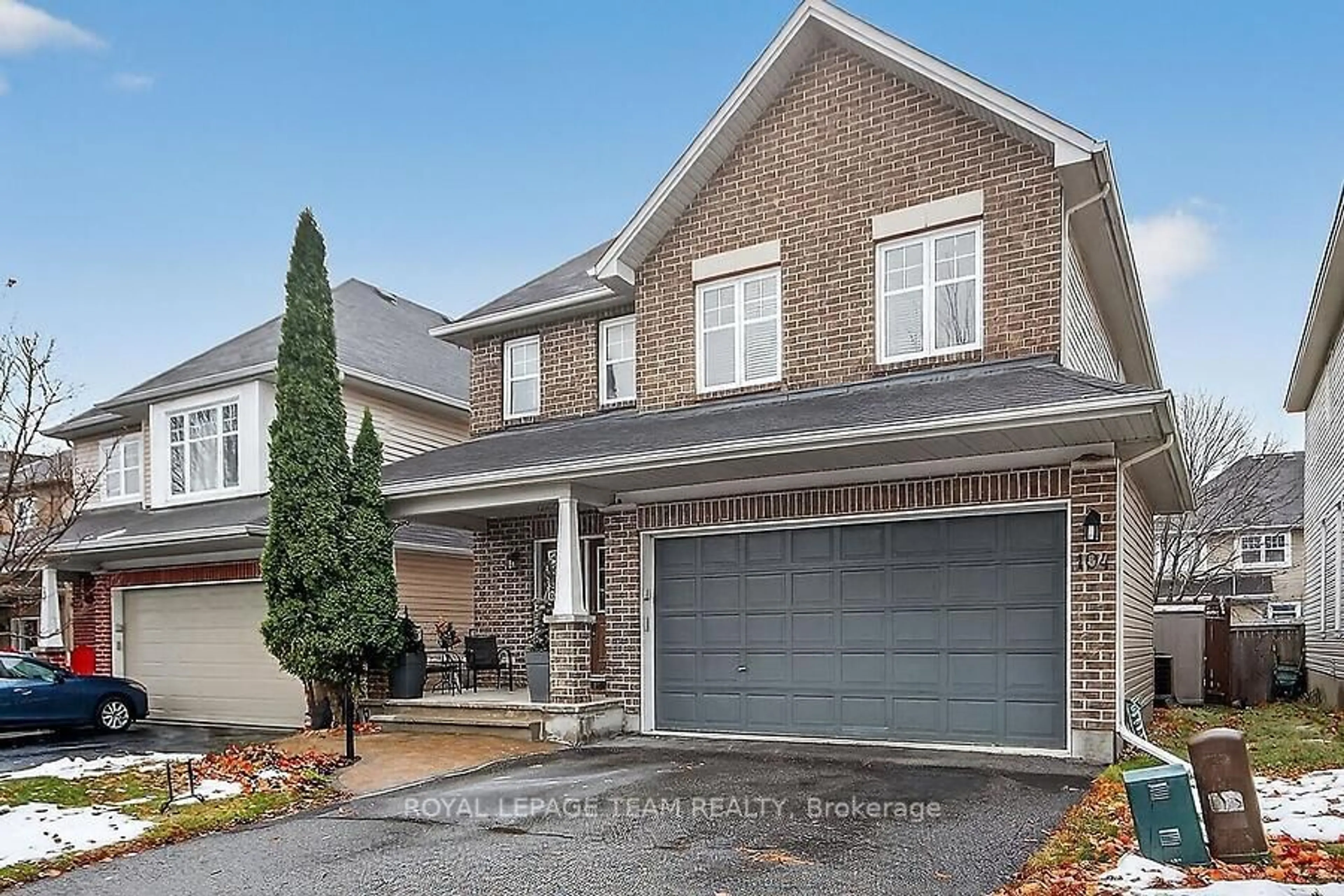 Home with brick exterior material, street for 104 Versilia Dr, Ottawa Ontario K2G 7E4