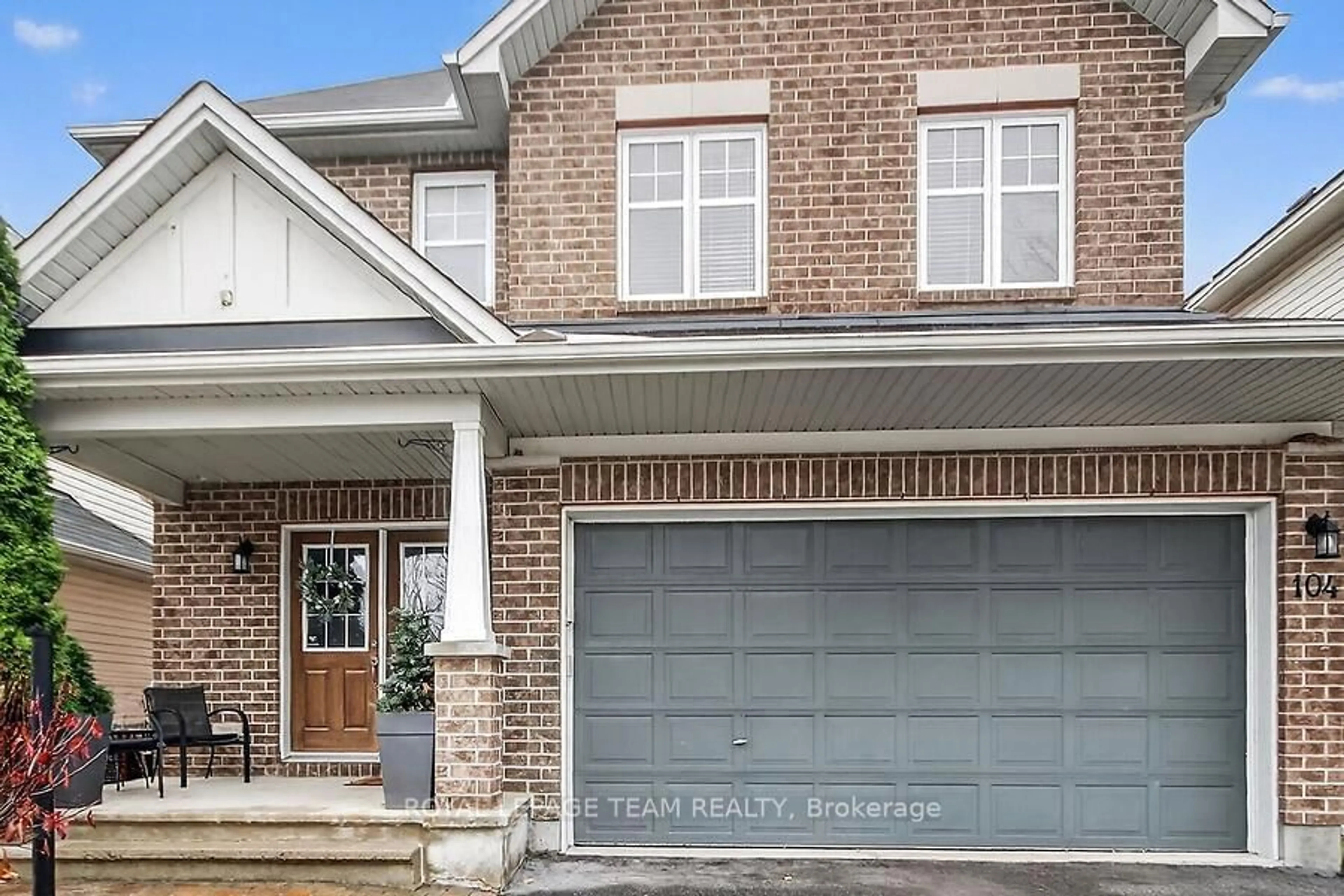 Home with brick exterior material, street for 104 Versilia Dr, Ottawa Ontario K2G 7E4