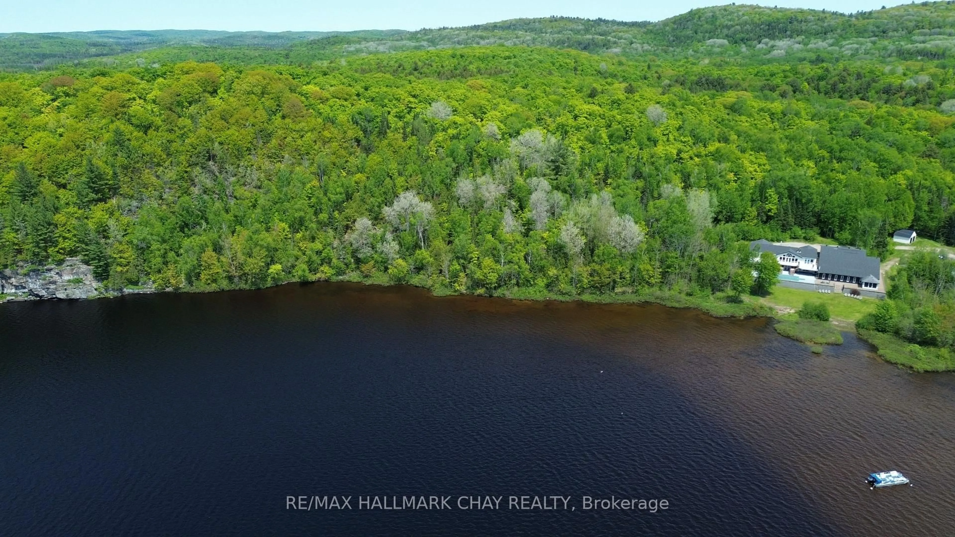 A pic from outside/outdoor area/front of a property/back of a property/a pic from drone, water/lake/river/ocean view for 2318 Pickerel & Jack Lake Rd, Armour Ontario P0A 1C0