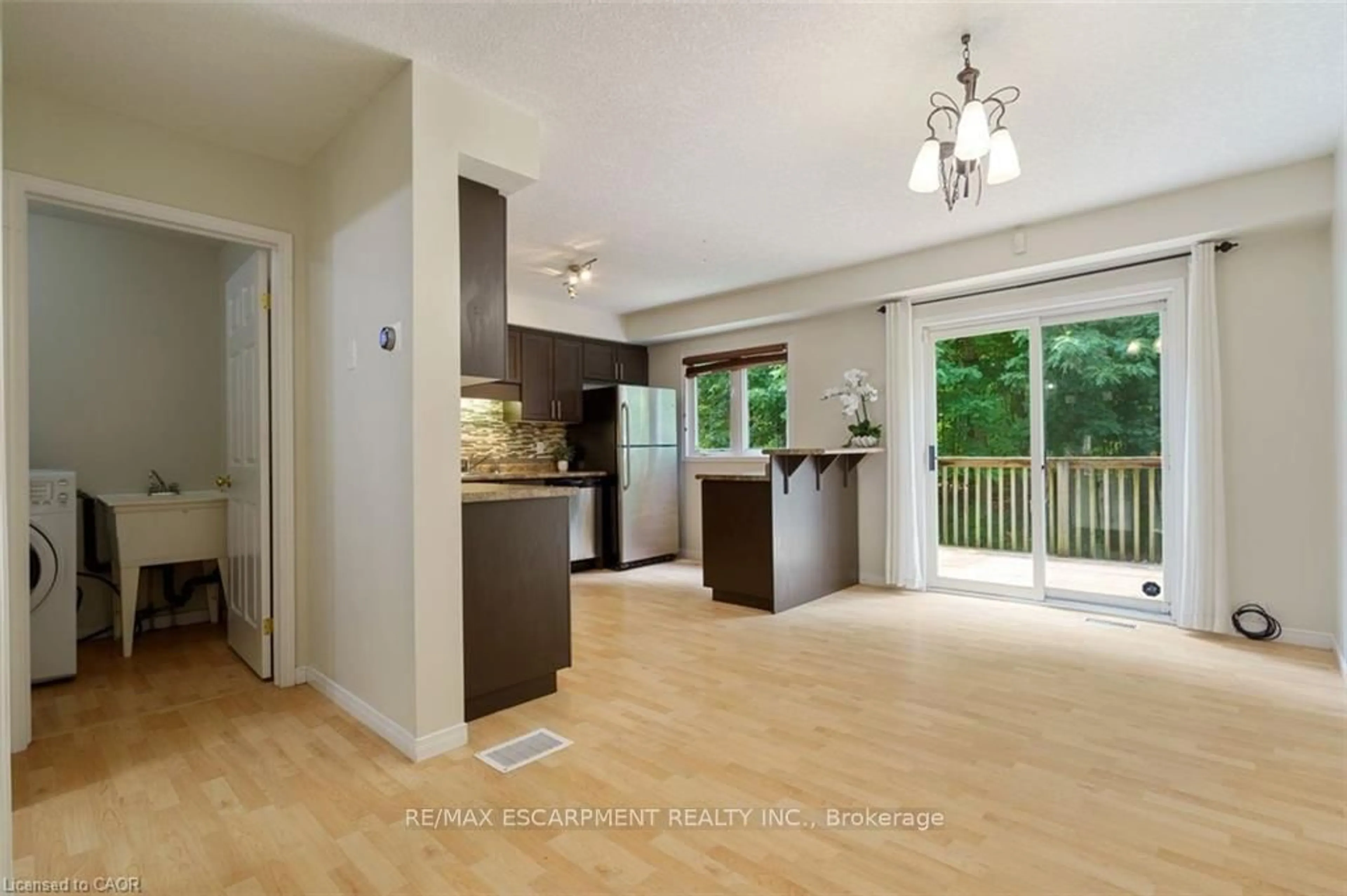 Open concept kitchen, wood/laminate floor for 175 David Bergey Dr #P87, Kitchener Ontario N2E 4H8