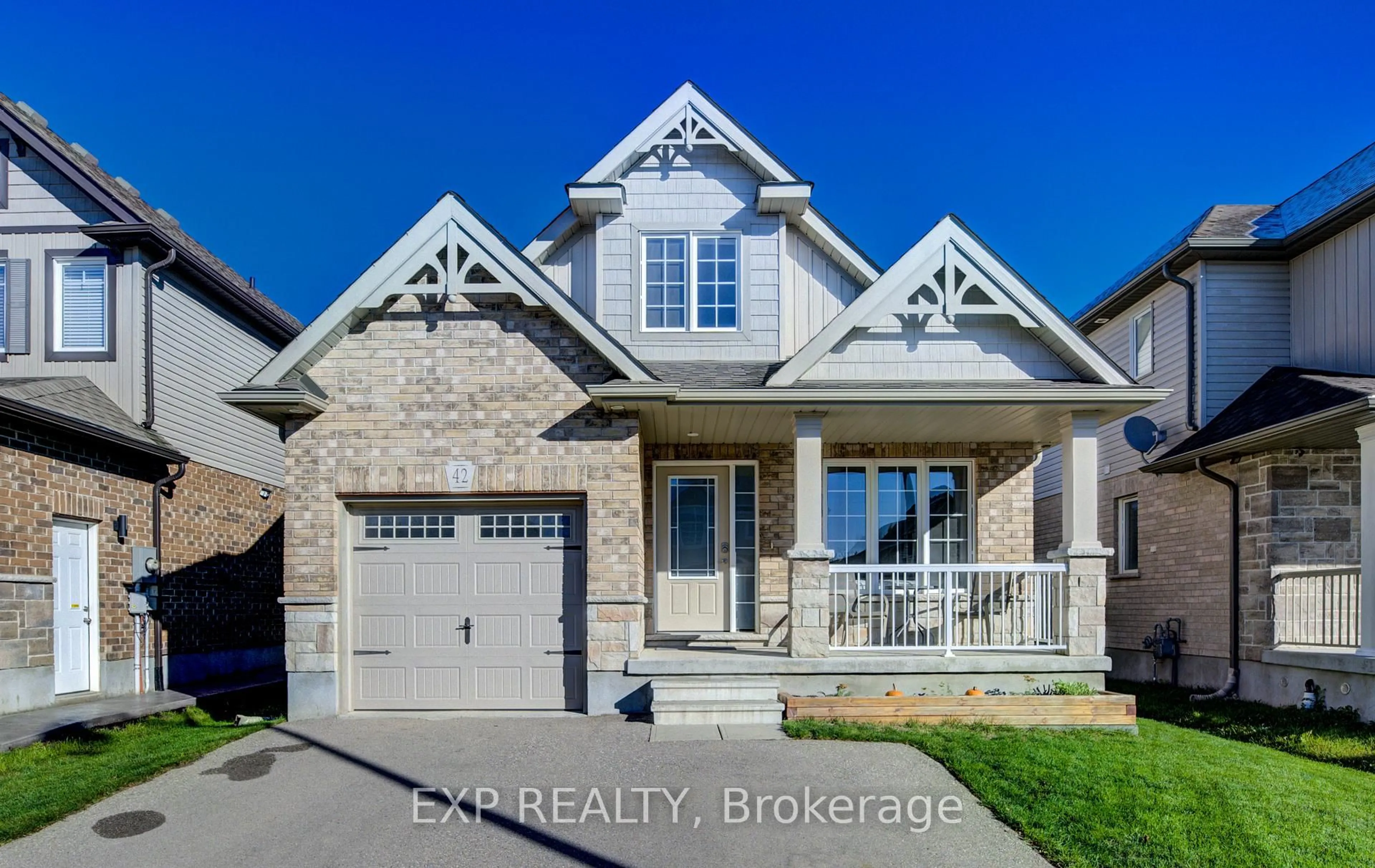 Home with brick exterior material, street for 42 Finoro Cres, Woolwich Ontario N3B 0C3