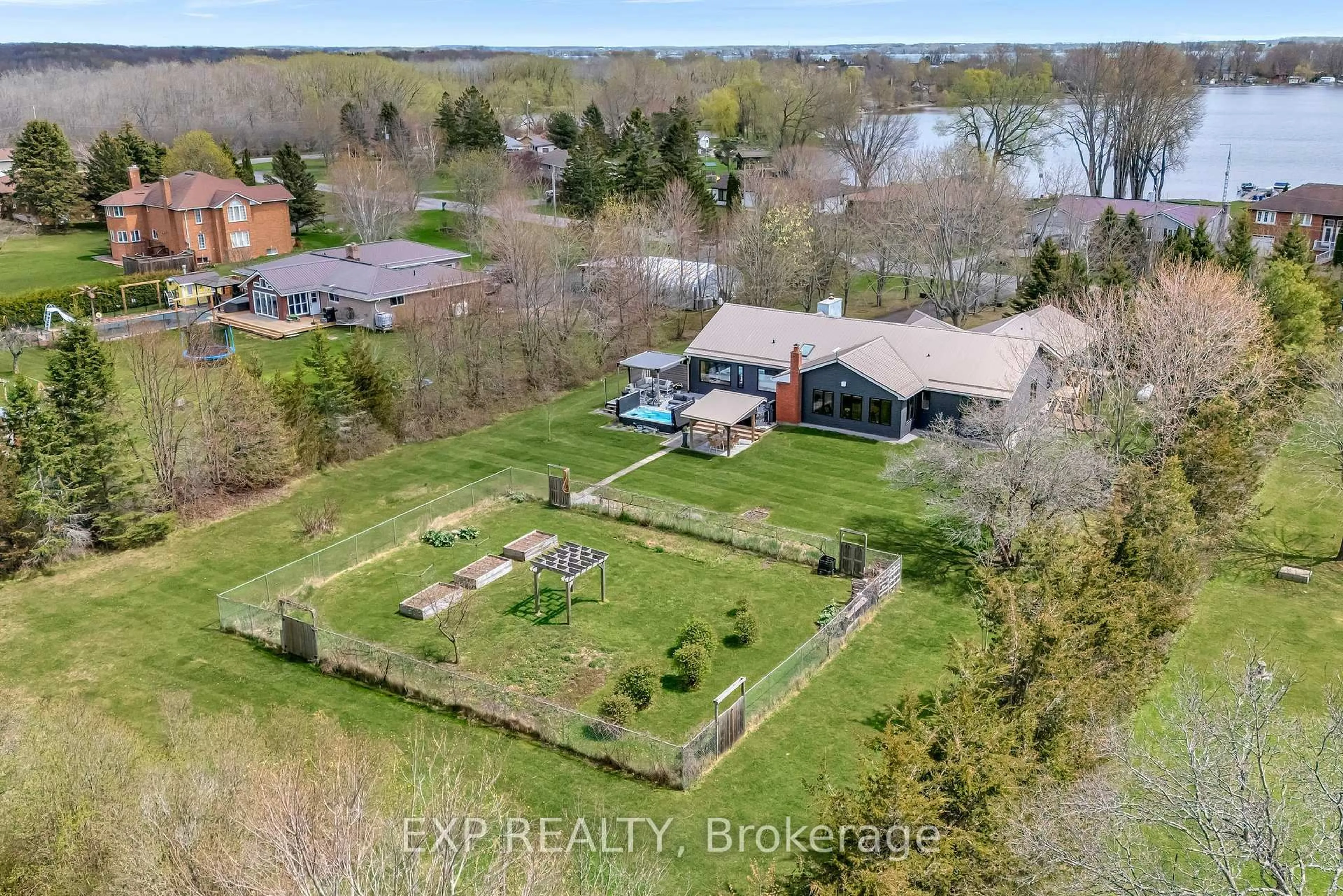 A pic from outside/outdoor area/front of a property/back of a property/a pic from drone, water/lake/river/ocean view for 135 Hiscock Shores Rd, Prince Edward County Ontario K0K 1L0