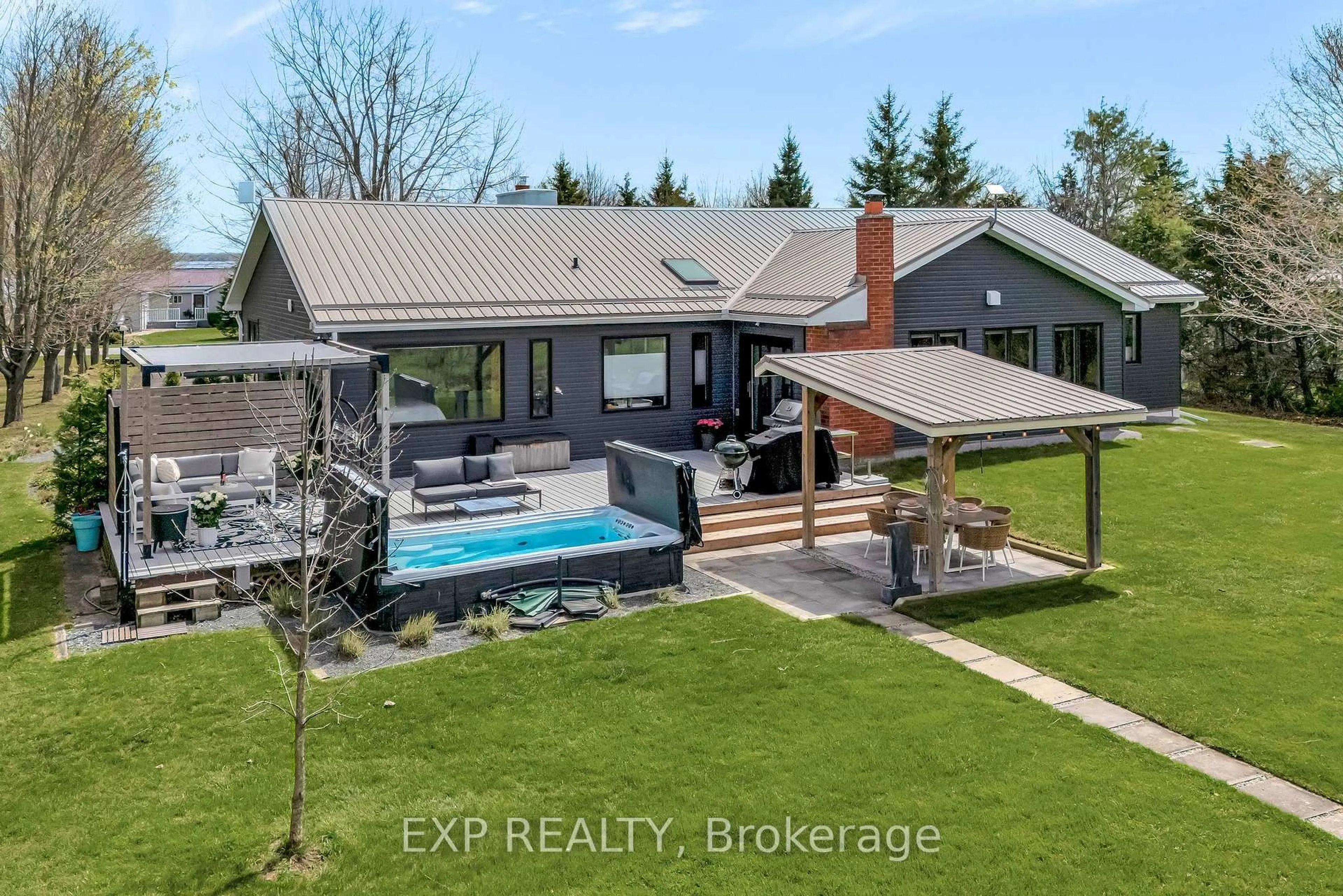 A pic from outside/outdoor area/front of a property/back of a property/a pic from drone, unknown for 135 Hiscock Shores Rd, Prince Edward County Ontario K0K 1L0