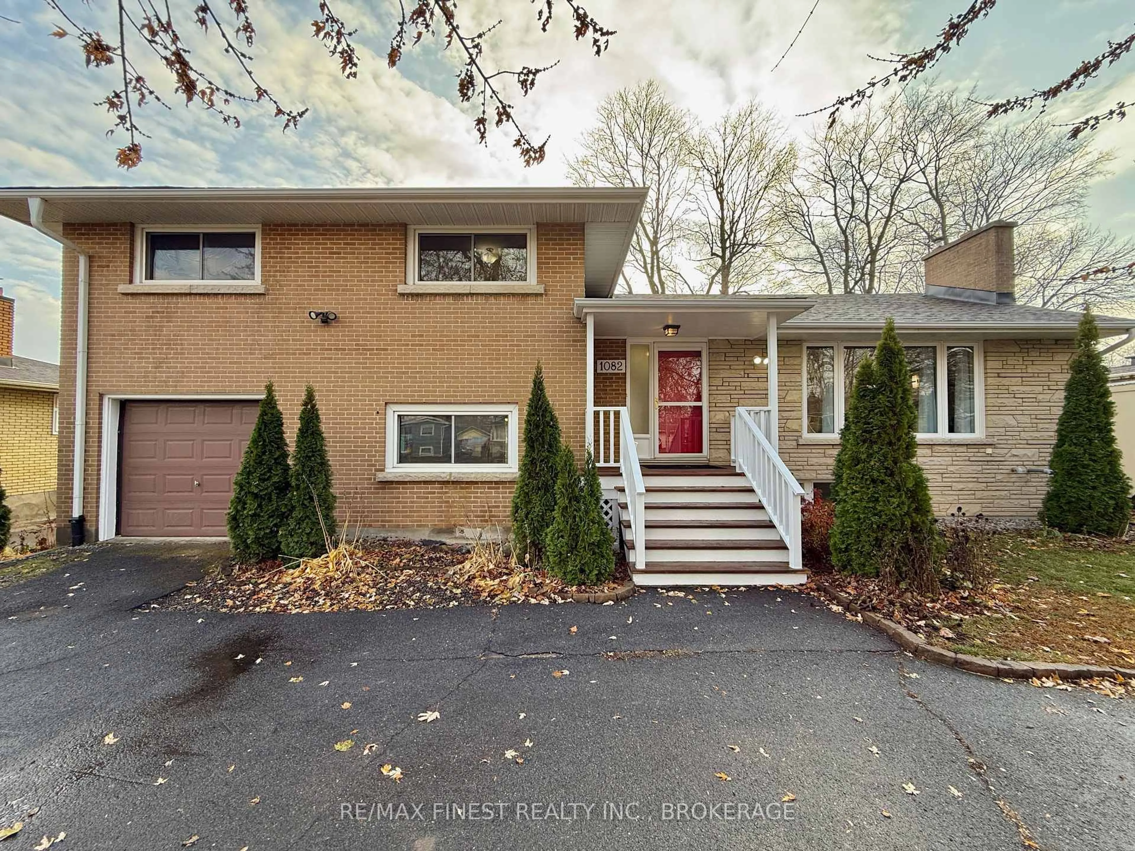 Home with brick exterior material, street for 1082 Johnson St, Kingston Ontario K7M 2N5