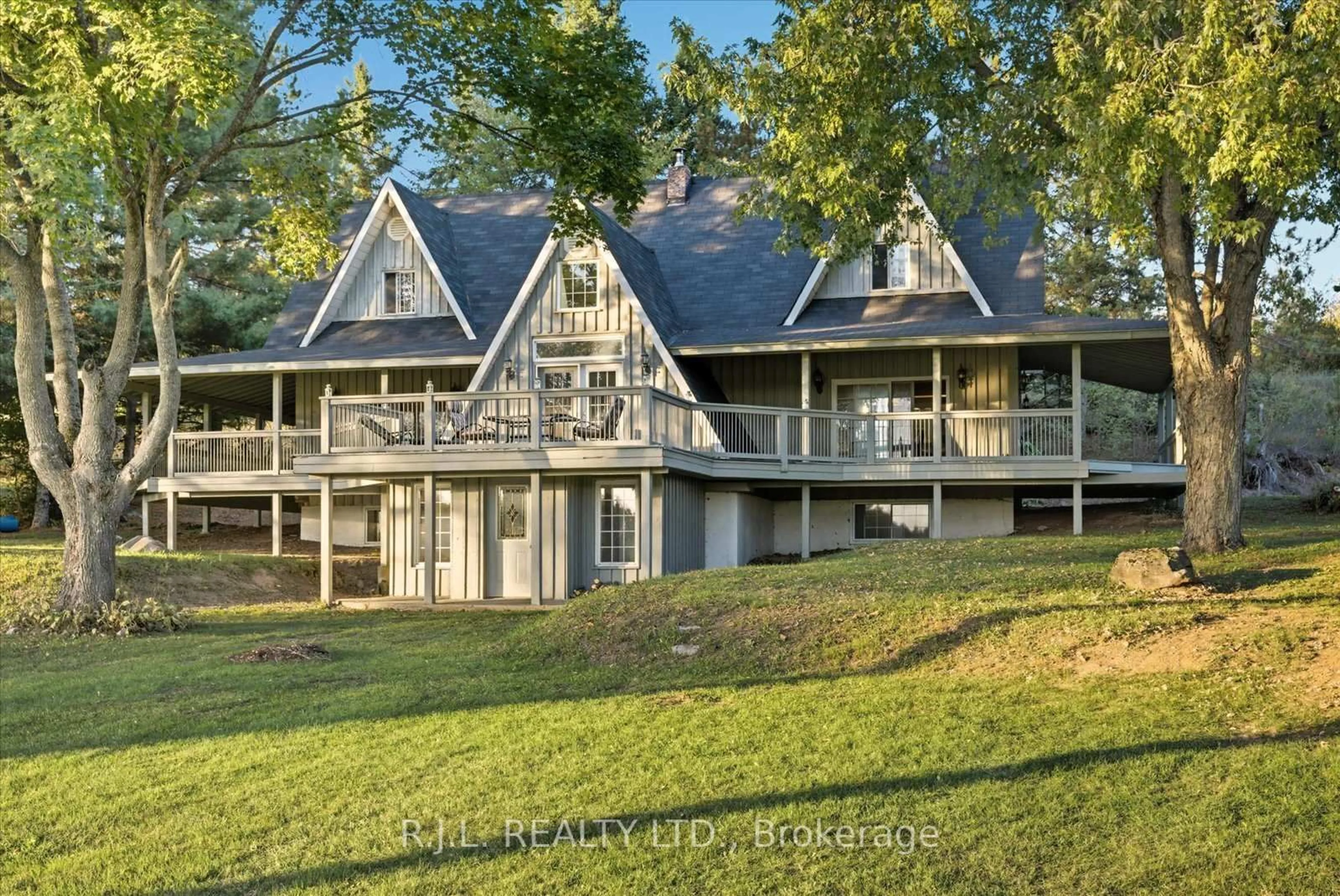 A pic from outside/outdoor area/front of a property/back of a property/a pic from drone, water/lake/river/ocean view for 600 6th Line, Douro-Dummer Ontario L0A 1J0