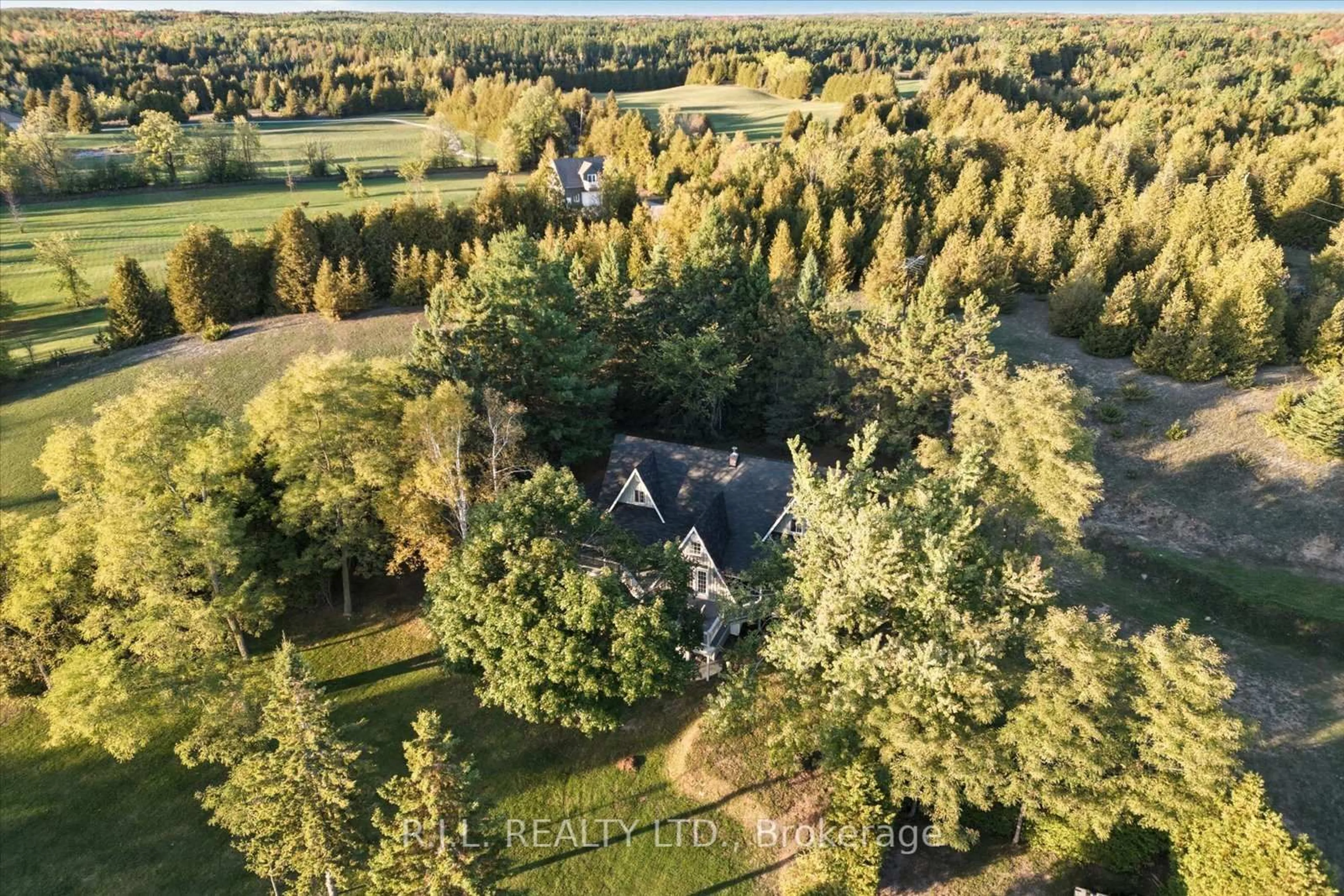 A pic from outside/outdoor area/front of a property/back of a property/a pic from drone, forest/trees view for 600 6th Line, Douro-Dummer Ontario L0A 1J0