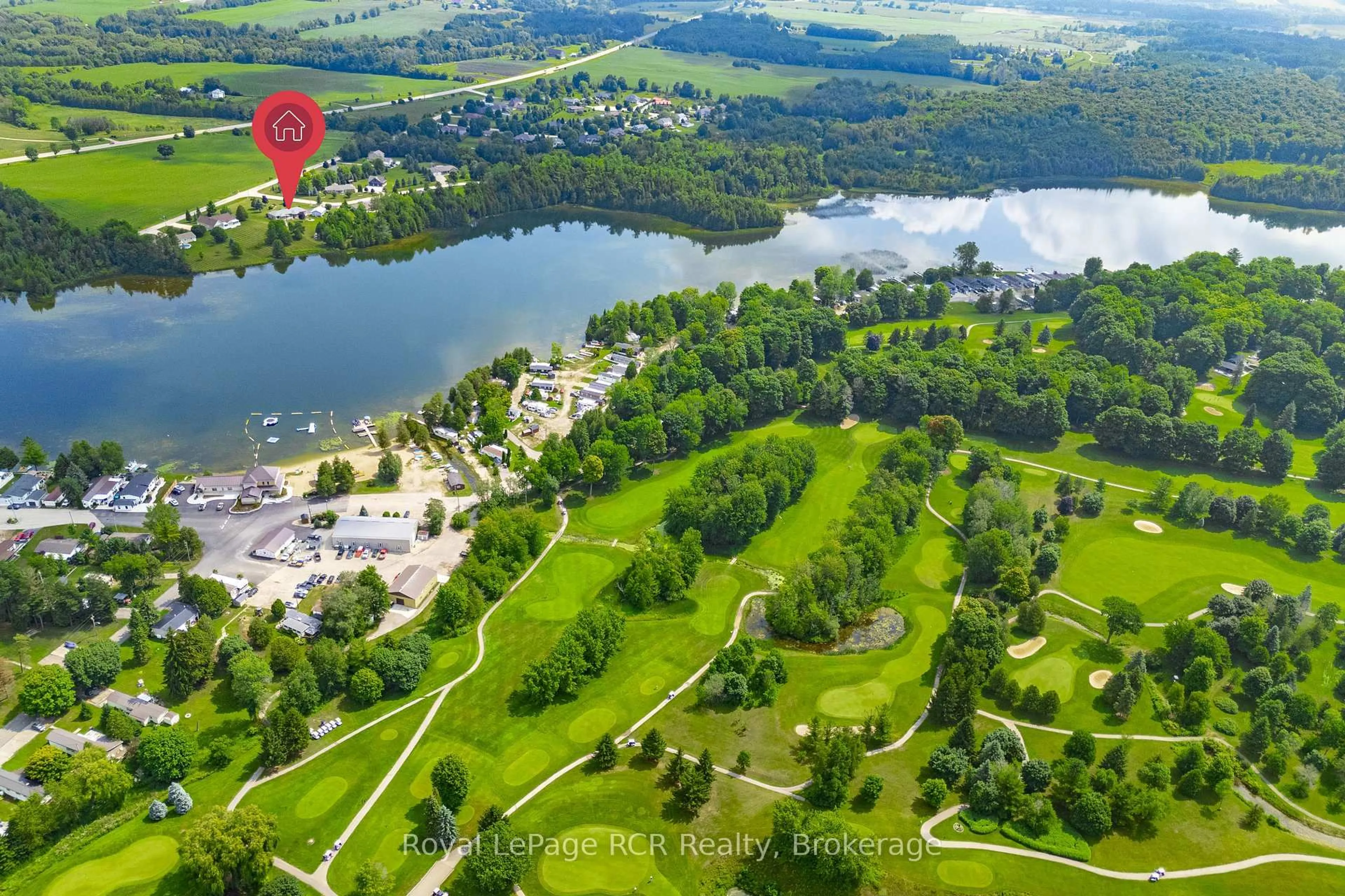 A pic from outside/outdoor area/front of a property/back of a property/a pic from drone, water/lake/river/ocean view for 2 Murray Way, Minto Ontario N0G 2L0