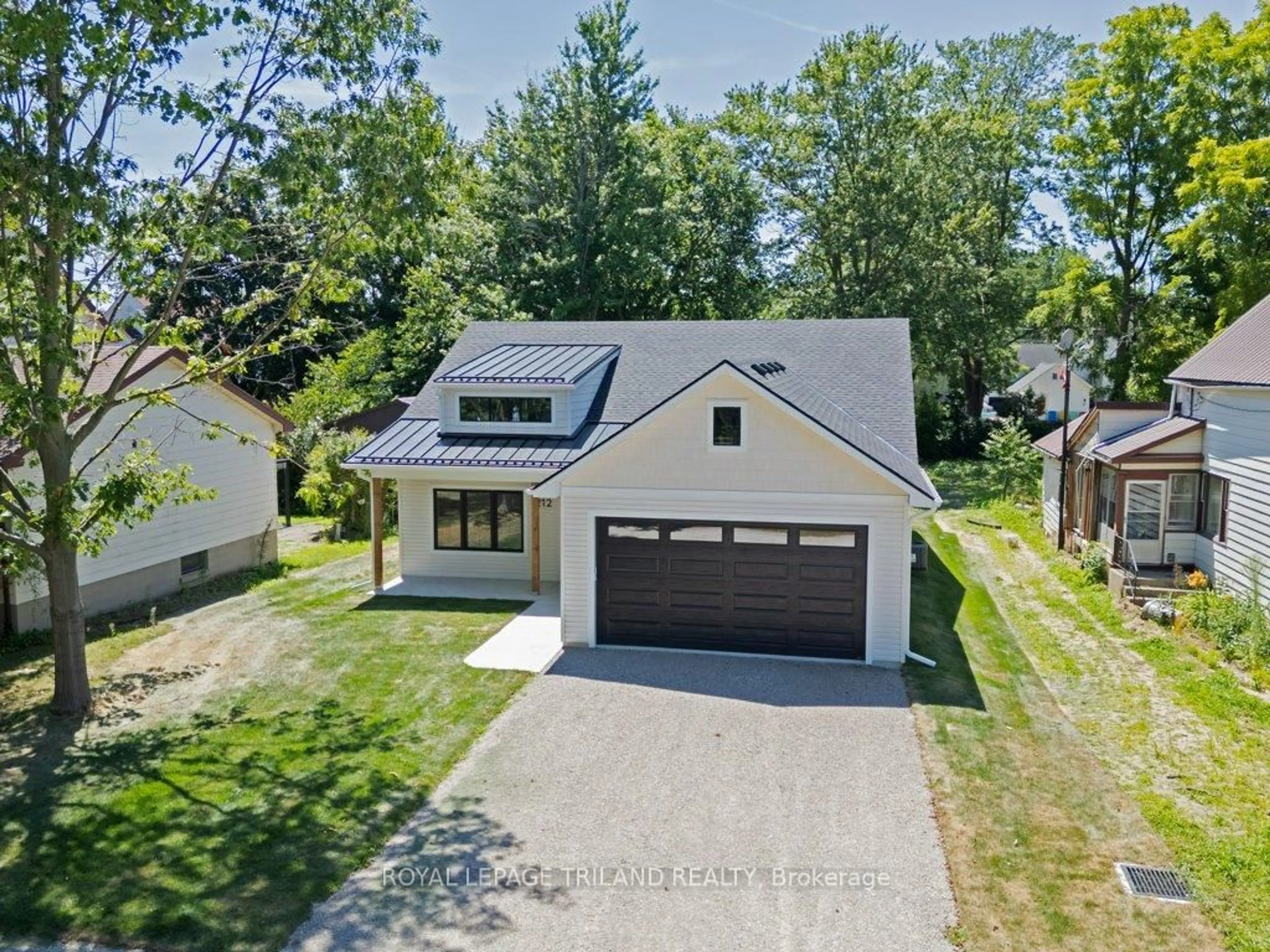 A pic from outside/outdoor area/front of a property/back of a property/a pic from drone, street for 212 Nancy St, Dutton/Dunwich Ontario N0L 1J0