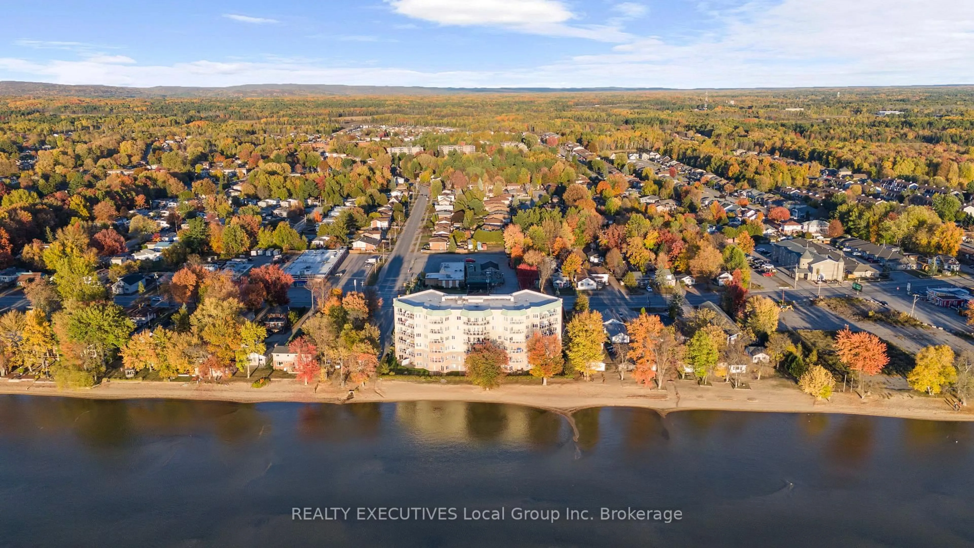 A pic from outside/outdoor area/front of a property/back of a property/a pic from drone, water/lake/river/ocean view for 533 LAKESHORE Dr #404, North Bay Ontario P1A 2E5