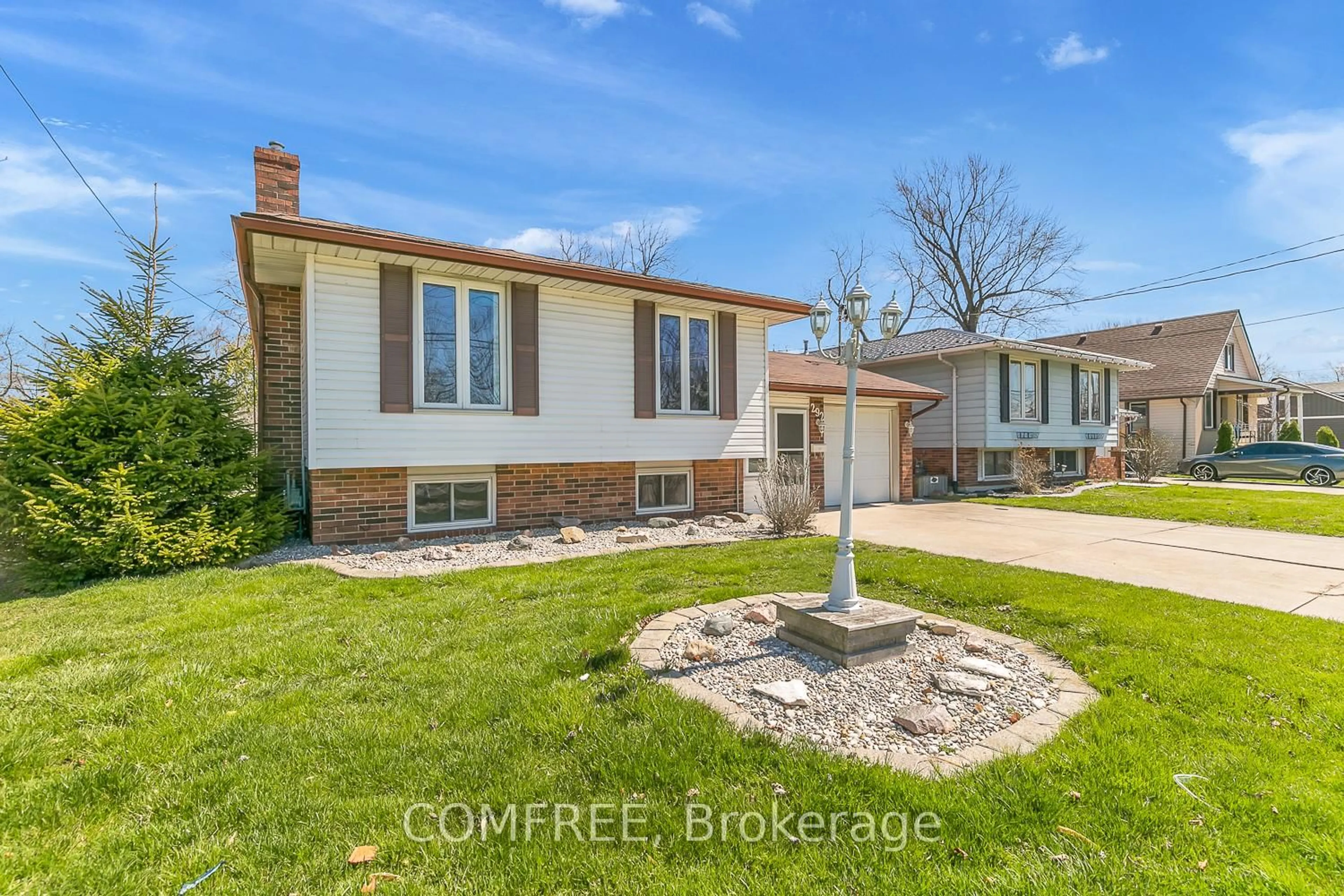 Home with brick exterior material, street for 292 Lesperance Rd, Tecumseh Ontario N8N 1W3