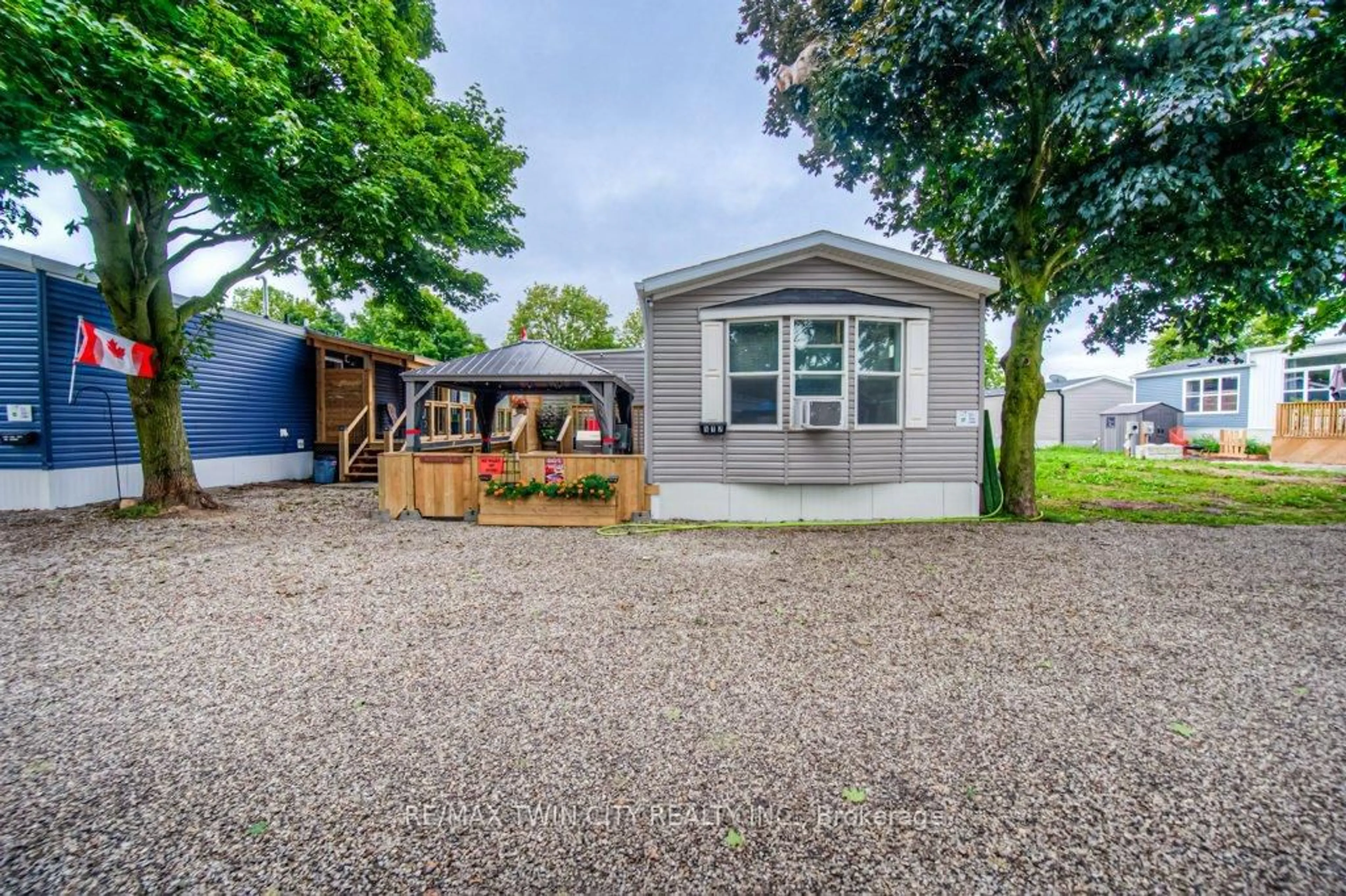 Home with vinyl exterior material, street for 99 Fourth Concession Rd #517, Brant Ontario N0E 1A0