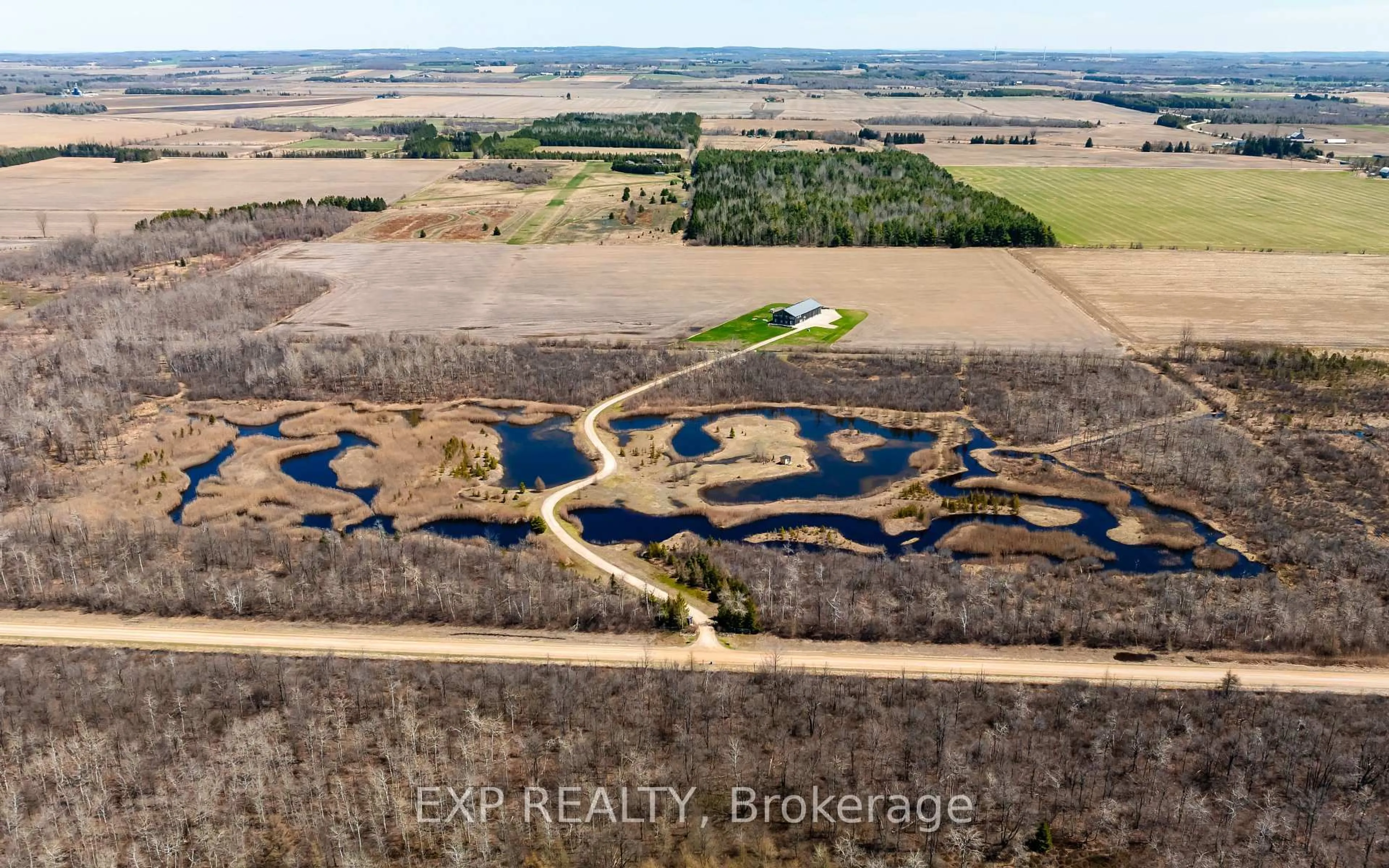 A pic from outside/outdoor area/front of a property/back of a property/a pic from drone, water/lake/river/ocean view for 295089 8th Line, Amaranth Ontario L9W 0K1