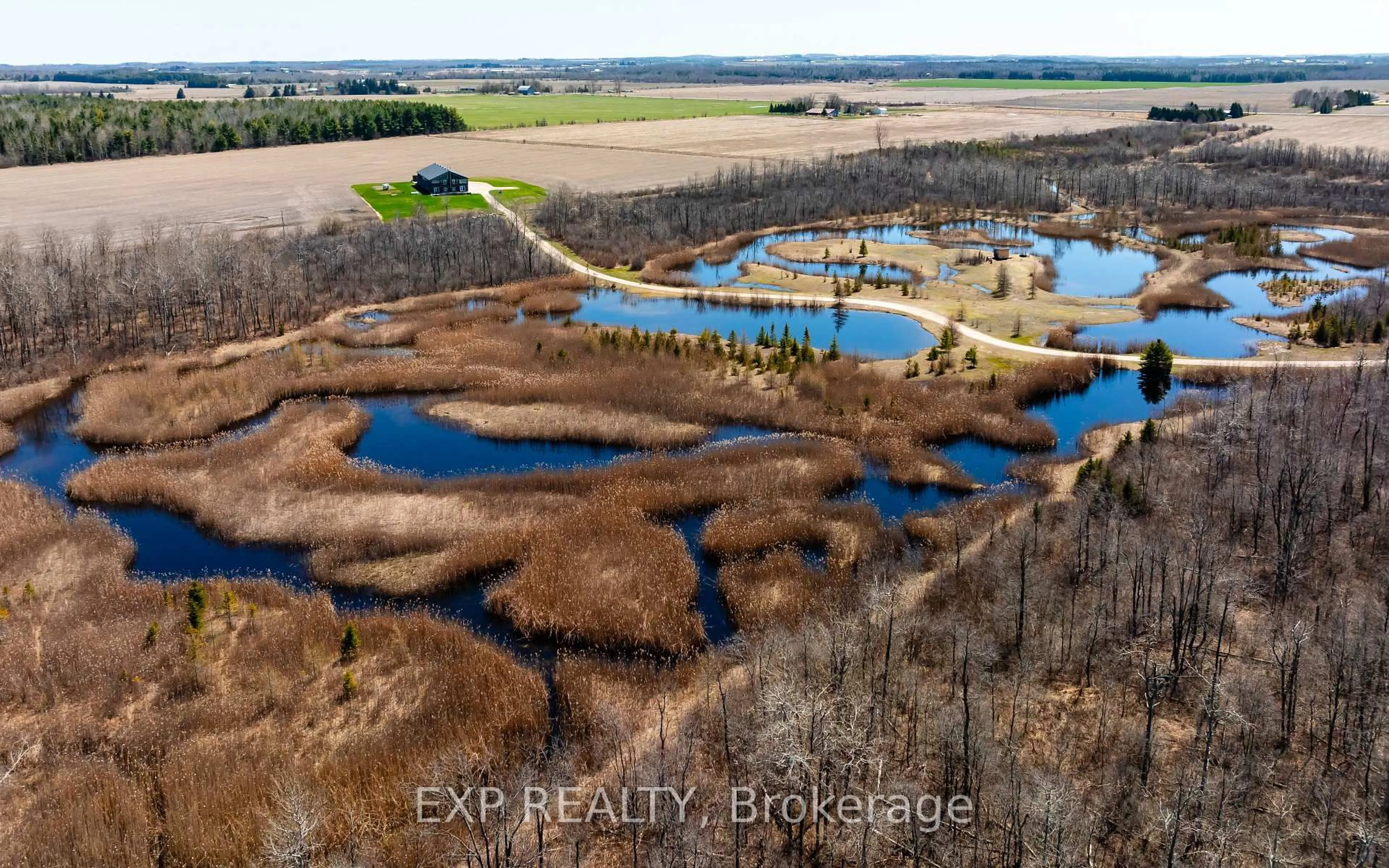 A pic from outside/outdoor area/front of a property/back of a property/a pic from drone, water/lake/river/ocean view for 295089 8th Line, Amaranth Ontario L9W 0K1