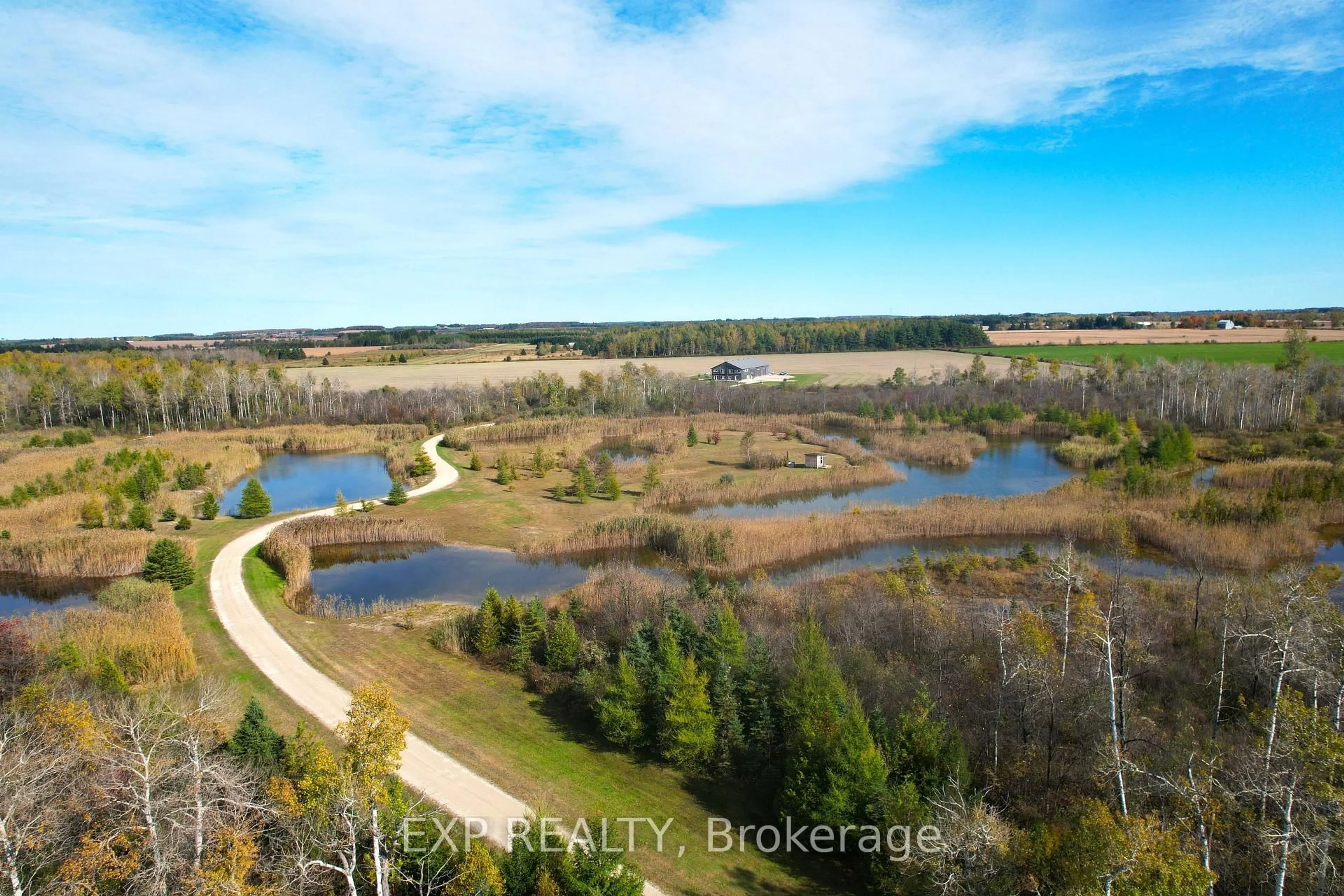 A pic from outside/outdoor area/front of a property/back of a property/a pic from drone, water/lake/river/ocean view for 295089 8th Line, Amaranth Ontario L9W 0K1