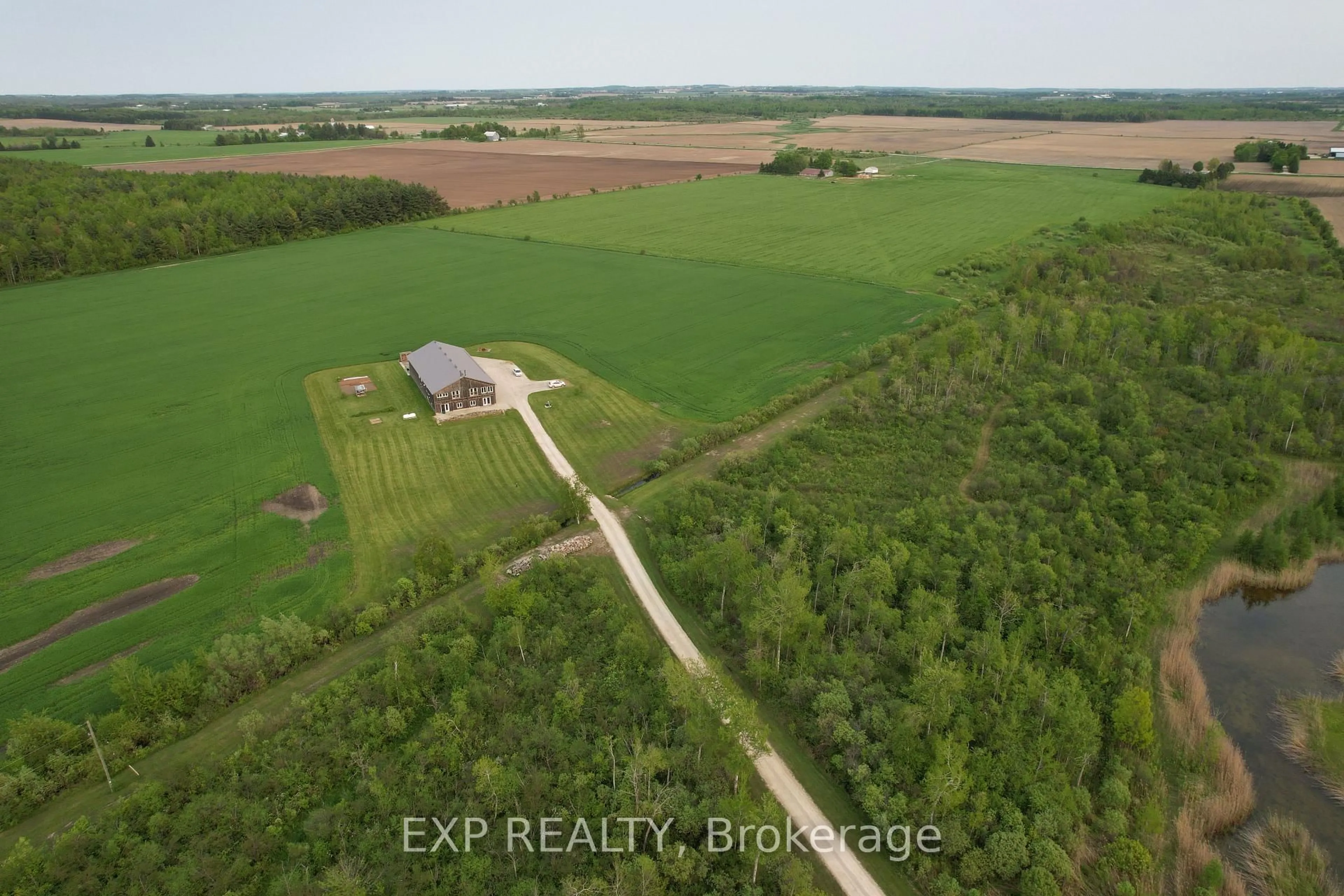 A pic from outside/outdoor area/front of a property/back of a property/a pic from drone, unknown for 295089 8th Line, Amaranth Ontario L9W 0K1