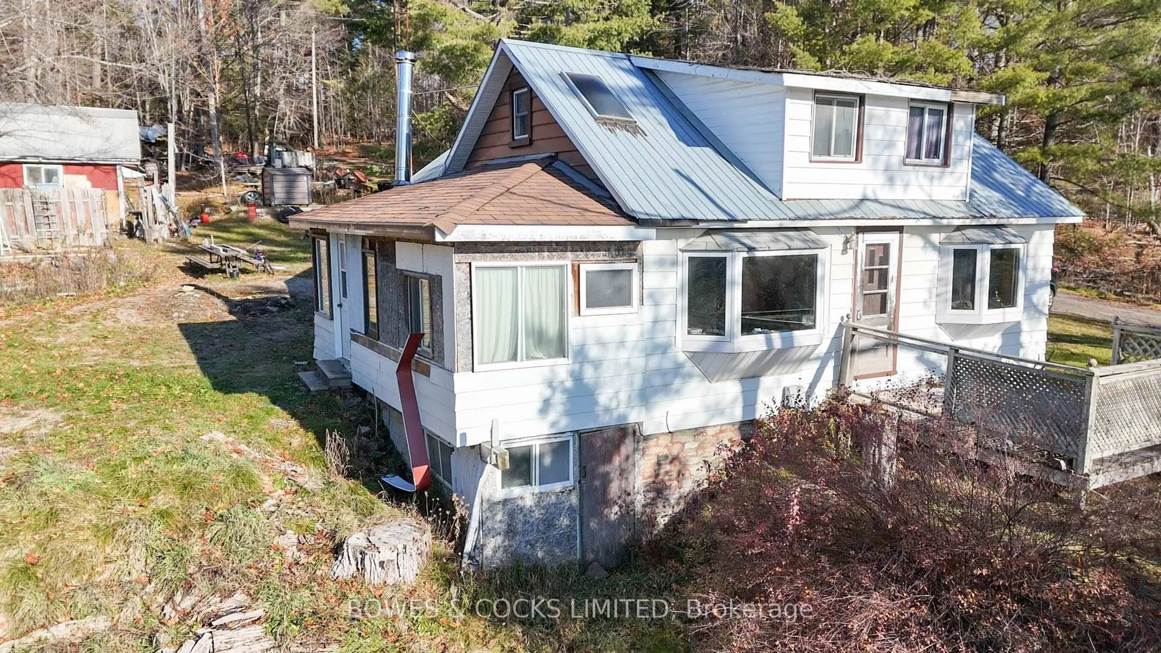 A pic from outside/outdoor area/front of a property/back of a property/a pic from drone, unknown for 180 County Road 504, North Kawartha Ontario K0L 1A0