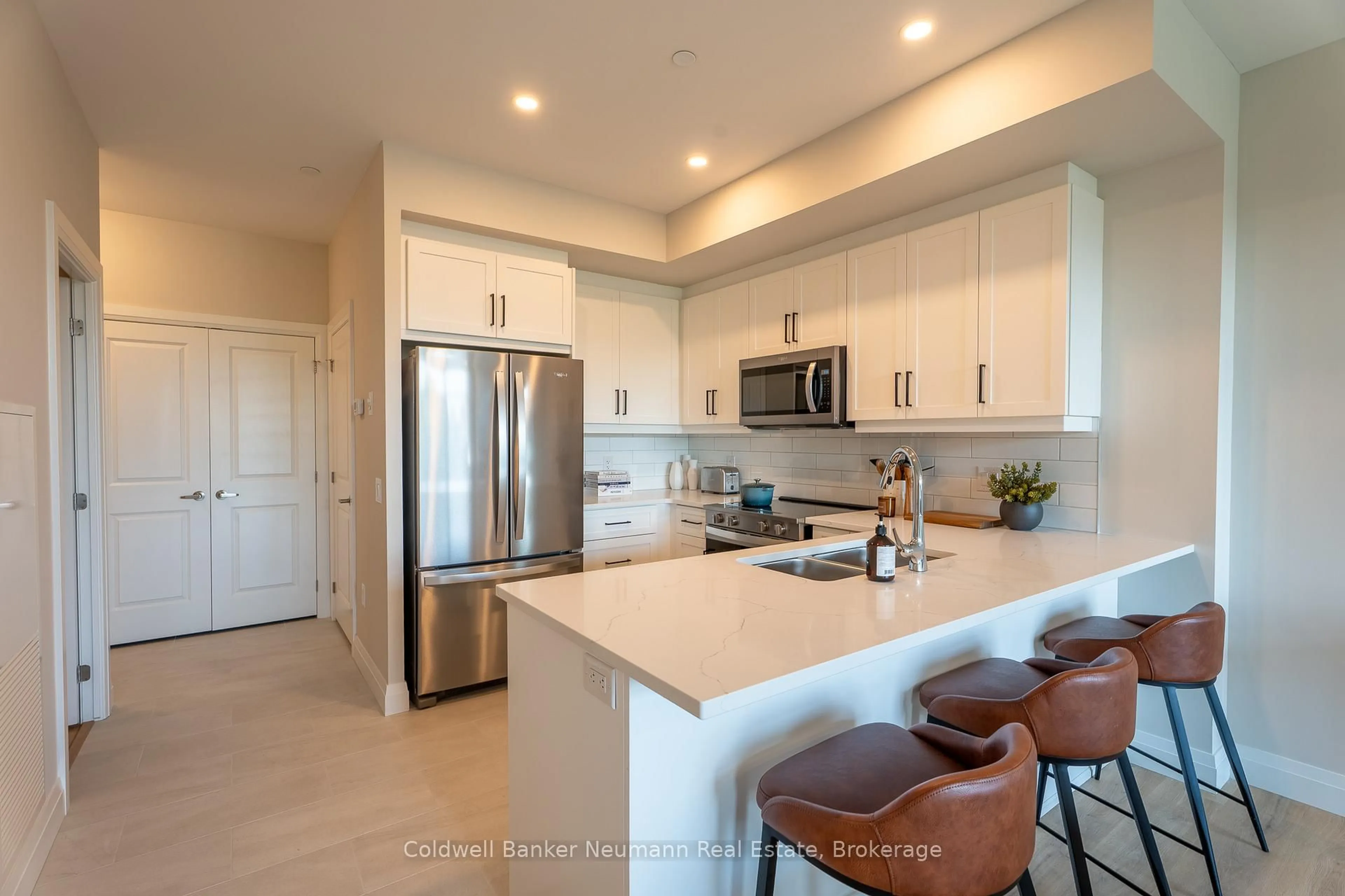 Open concept kitchen, ceramic/tile floor for 1882 Gordon St #322, Guelph Ontario N1K 0P6