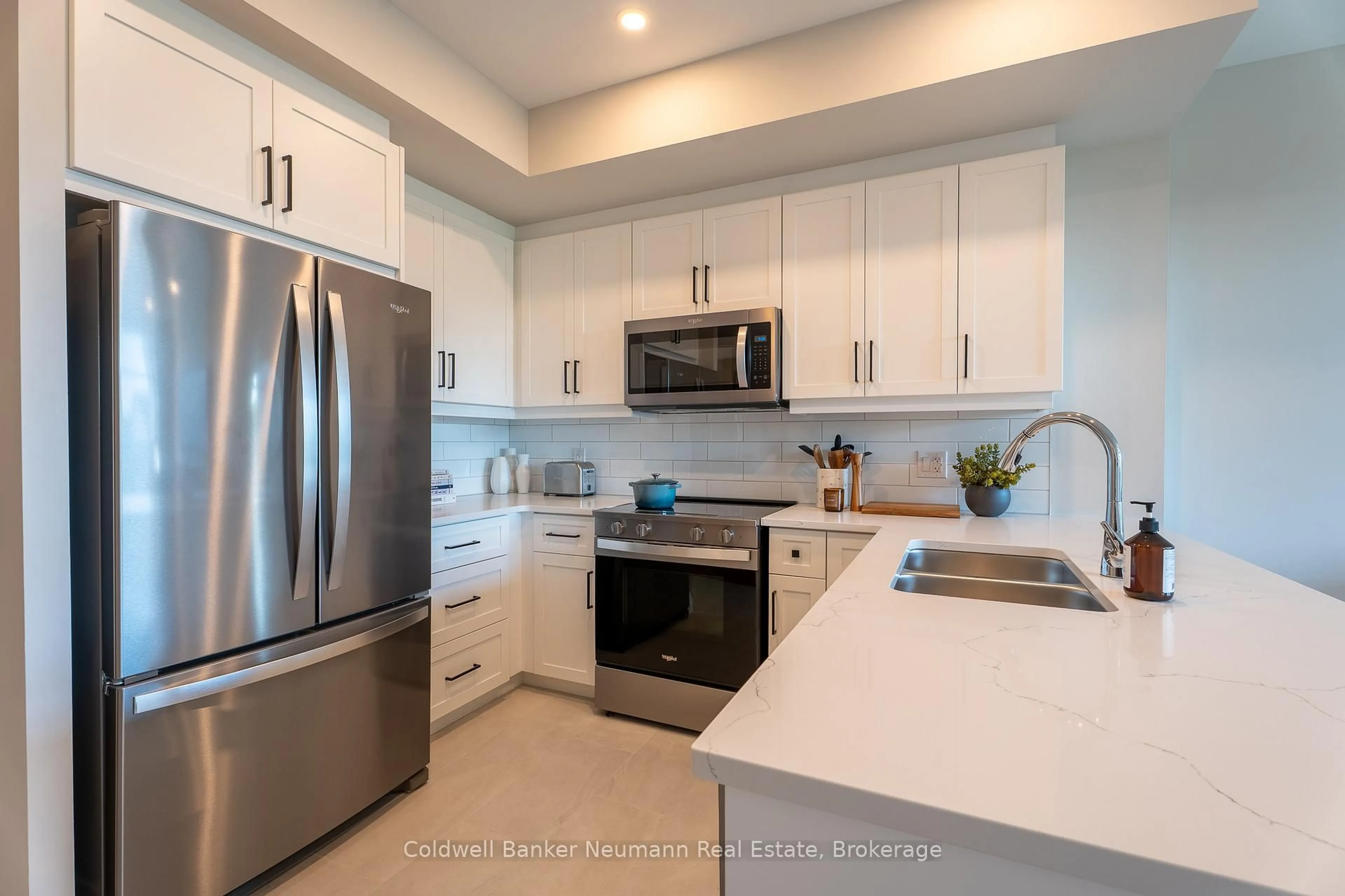 Open concept kitchen, ceramic/tile floor for 1882 Gordon St #322, Guelph Ontario N1K 0P6