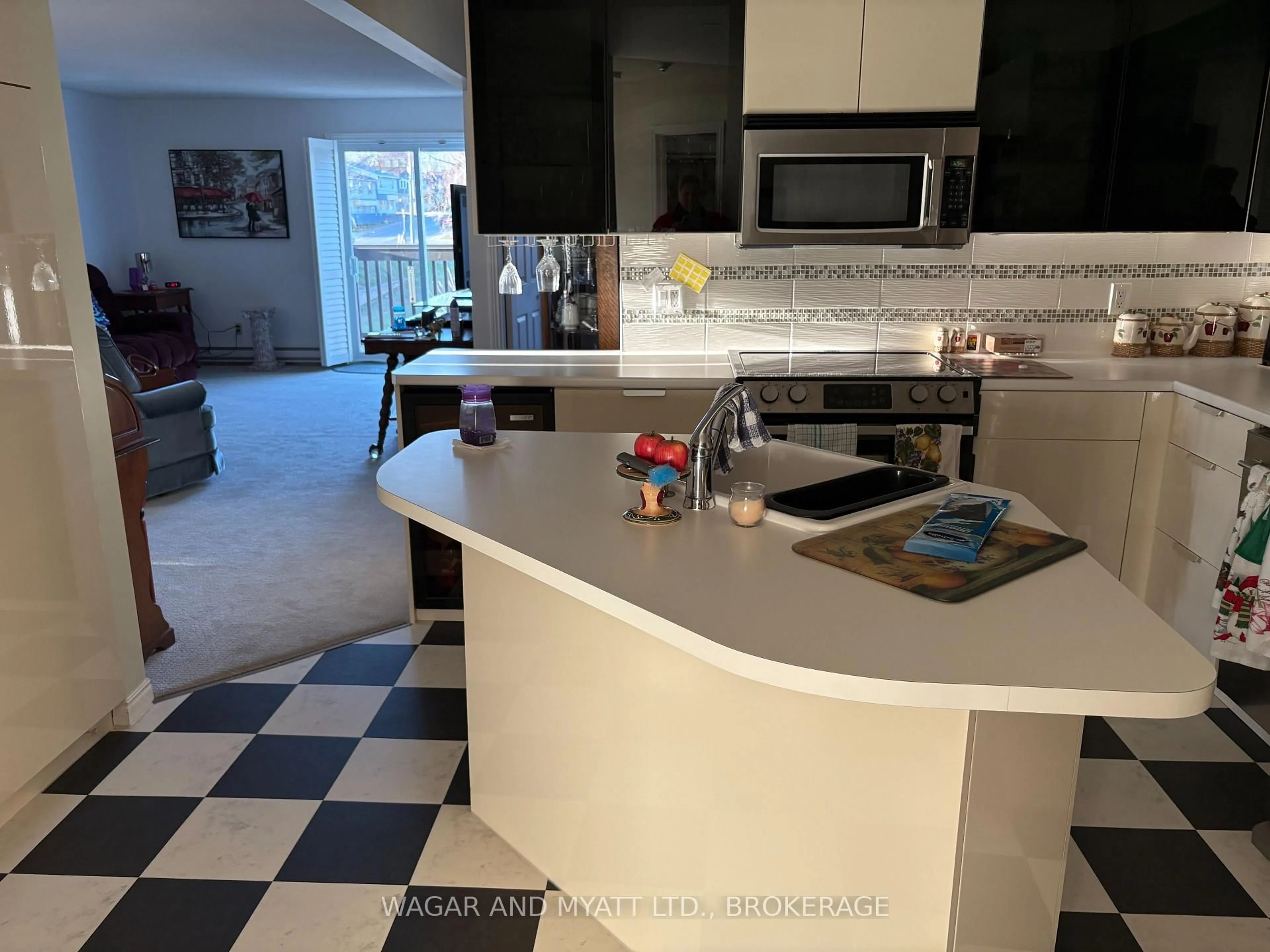 Open concept kitchen, ceramic/tile floor for 7 CENTRE St #303, Greater Napanee Ontario K7R 3X3
