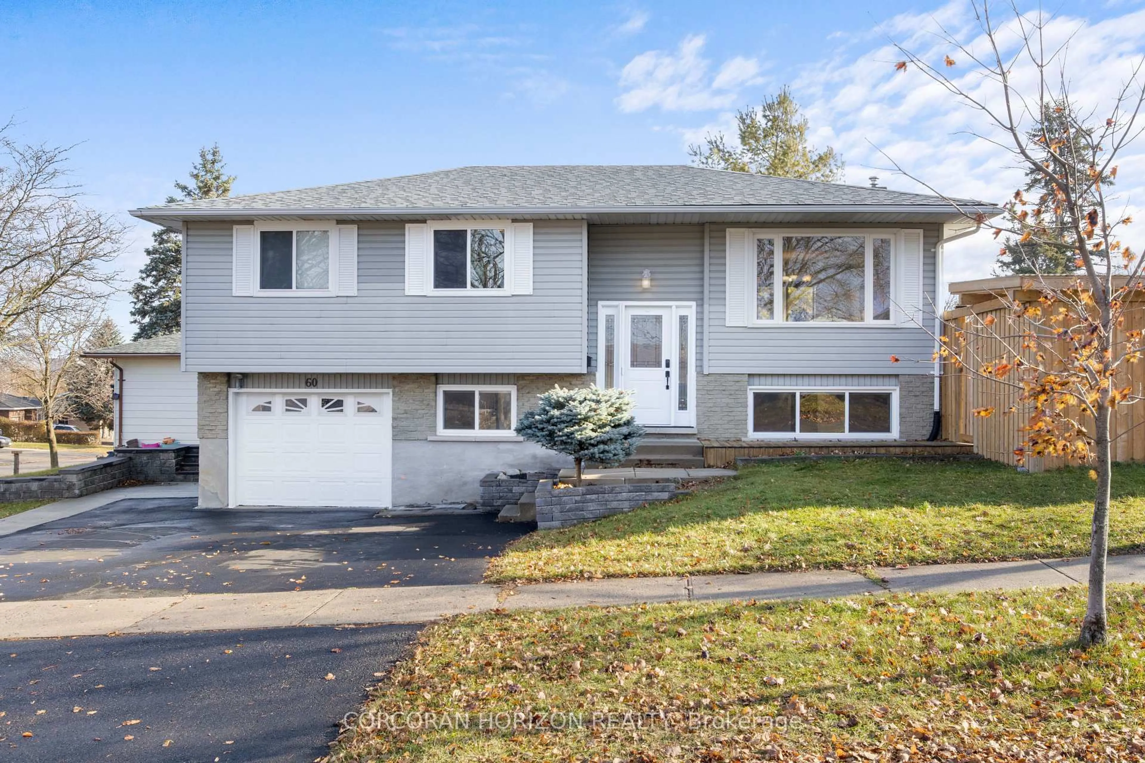 Home with vinyl exterior material, street for 60 Devonglen Dr, Kitchener Ontario N2E 2C5