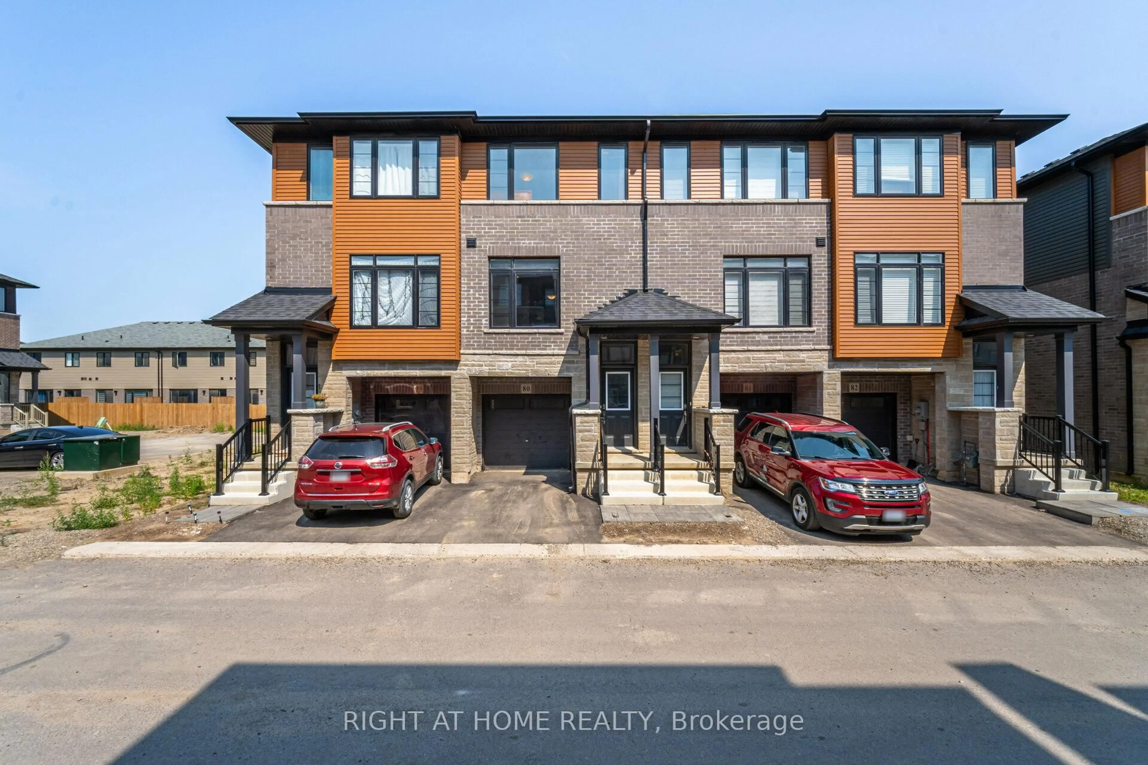 A pic from outside/outdoor area/front of a property/back of a property/a pic from drone, street for 461 Blackburn Dr #80, Brantford Ontario N3T 0W9