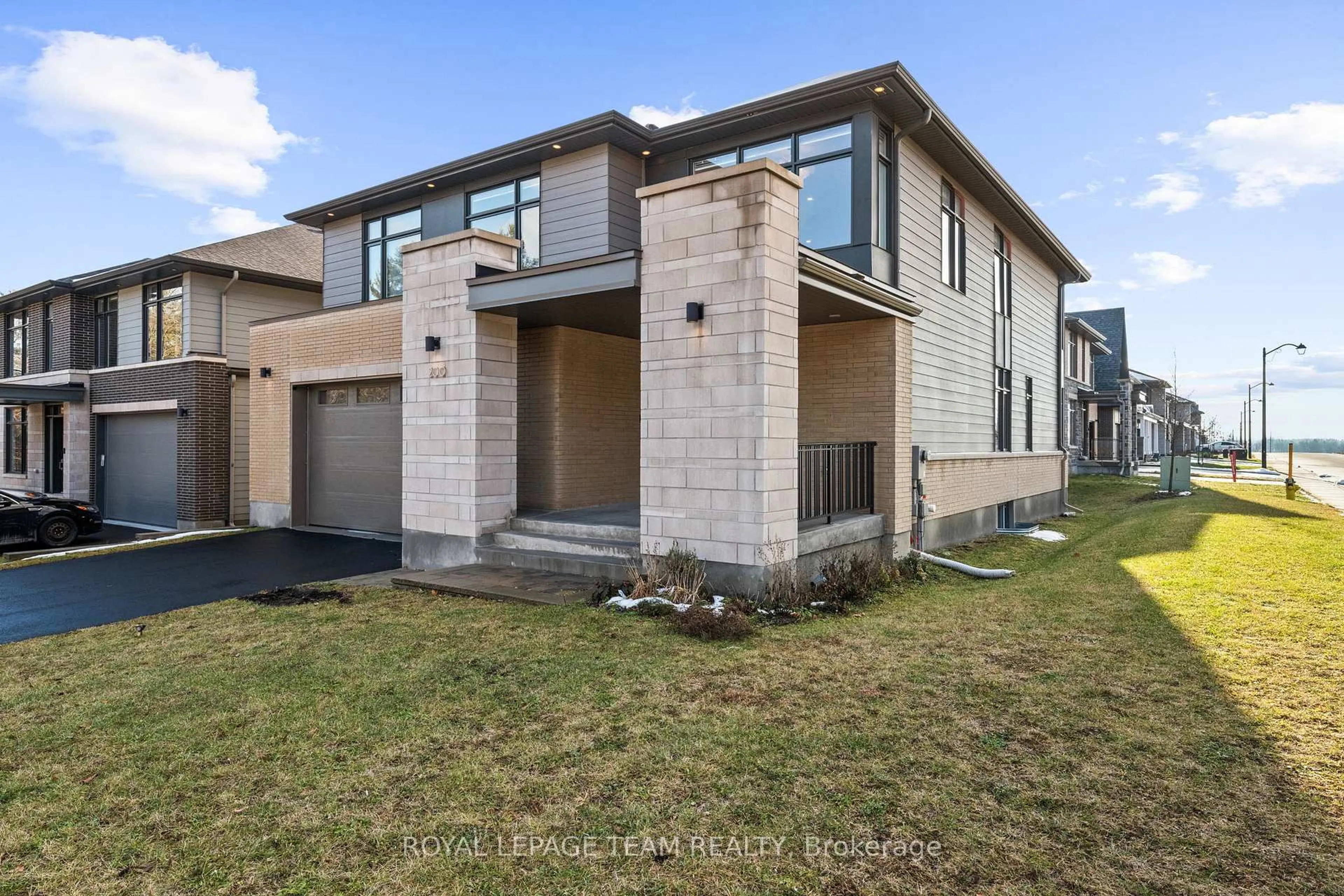 Home with brick exterior material, street for 200 Ketchikan Cres, Ottawa Ontario K2T 0S3