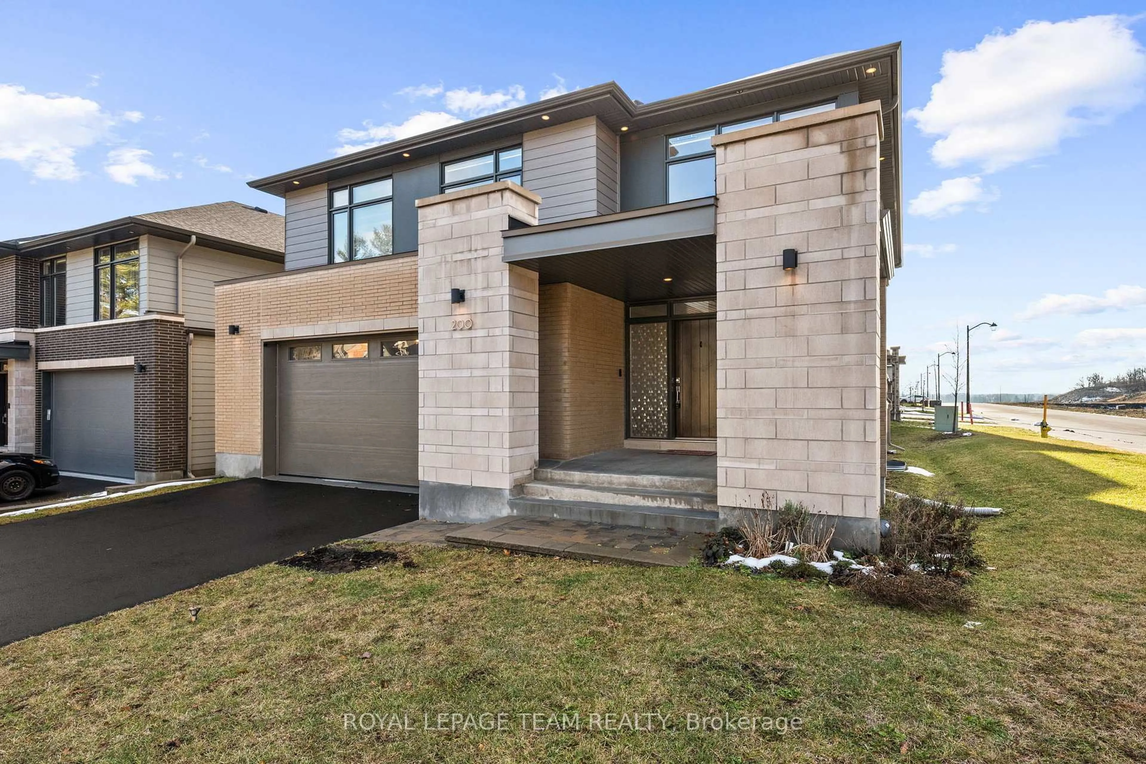 Home with brick exterior material, street for 200 Ketchikan Cres, Ottawa Ontario K2T 0S3