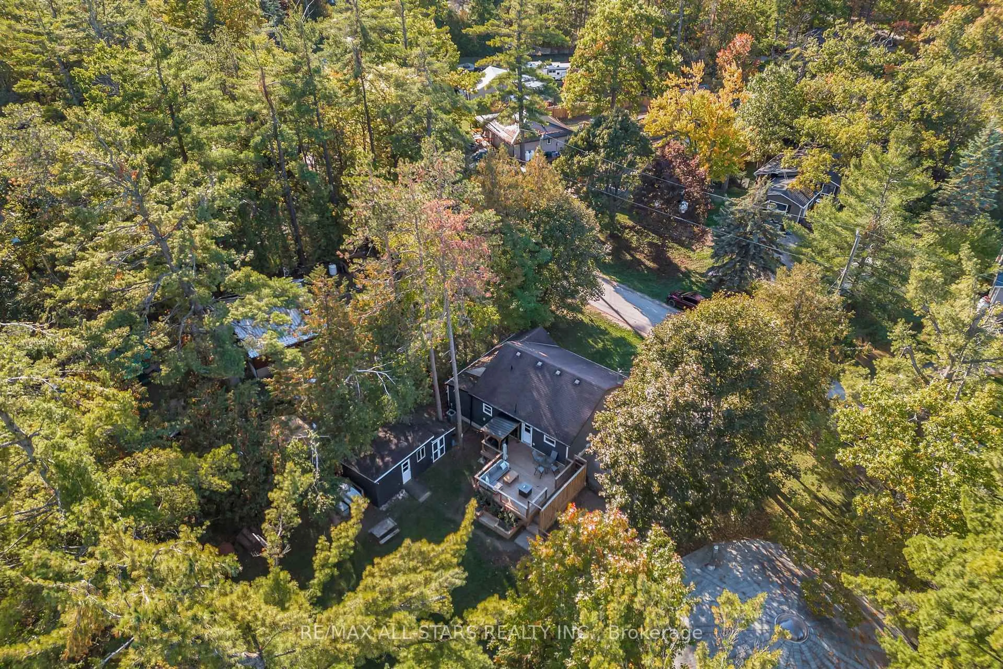 A pic from outside/outdoor area/front of a property/back of a property/a pic from drone, forest/trees view for 16 Parkhill Dr, Kawartha Lakes Ontario K0M 1N0