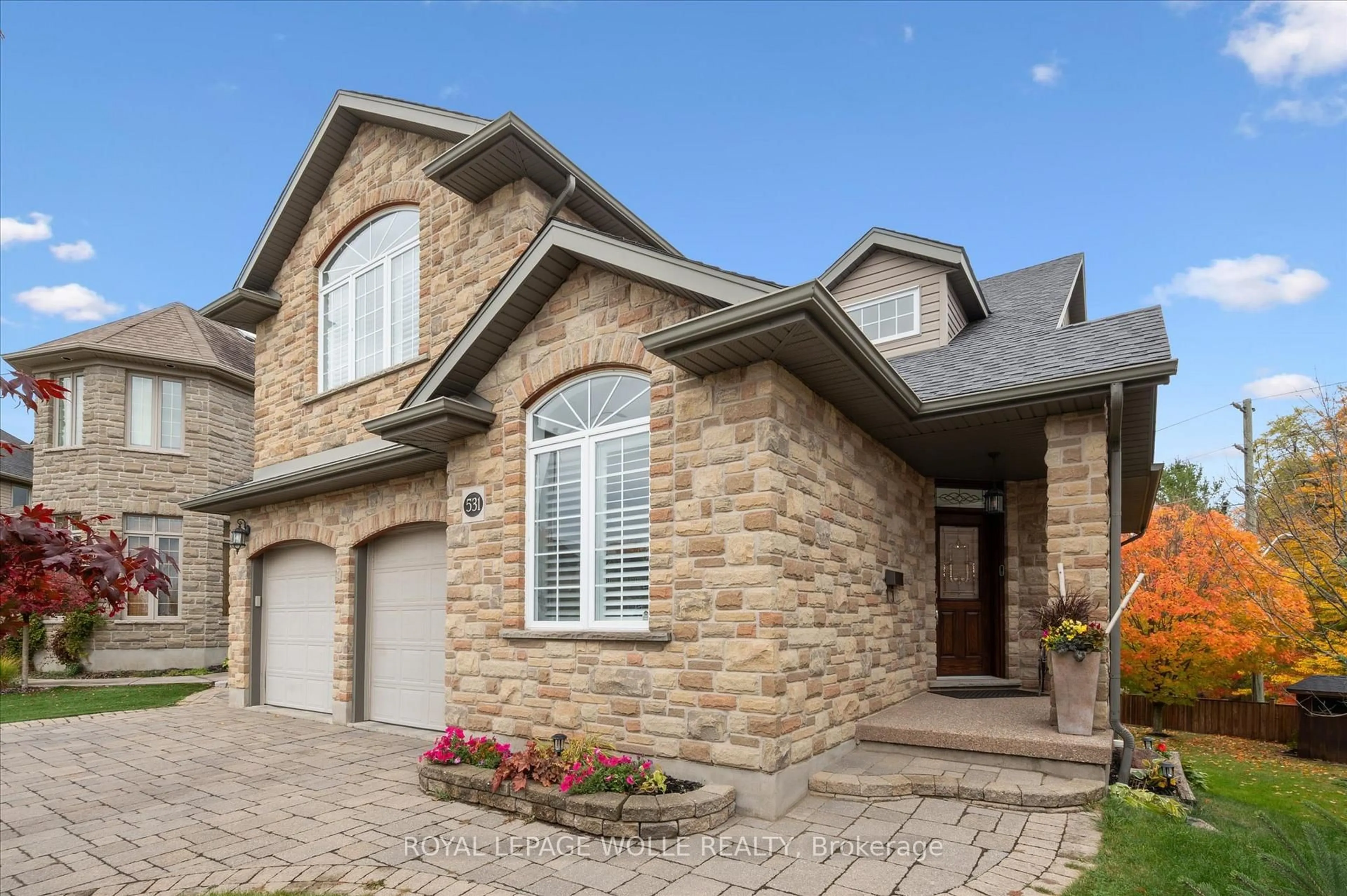 Home with brick exterior material, street for 531 Wood Nettle Way, Waterloo Ontario N2V 2X9