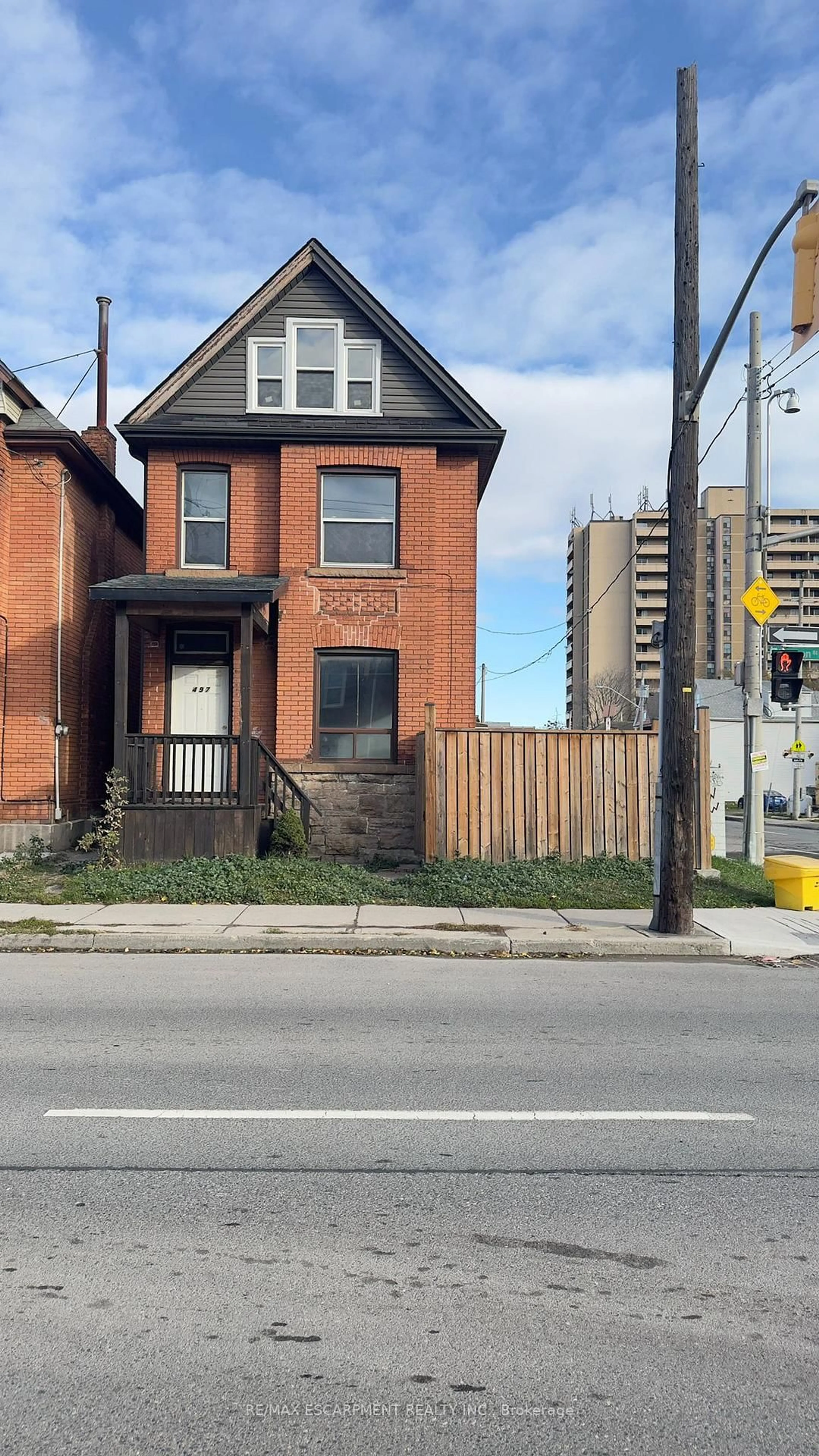 Home with brick exterior material, street for 497 Cannon St, Hamilton Ontario L8L 2E5
