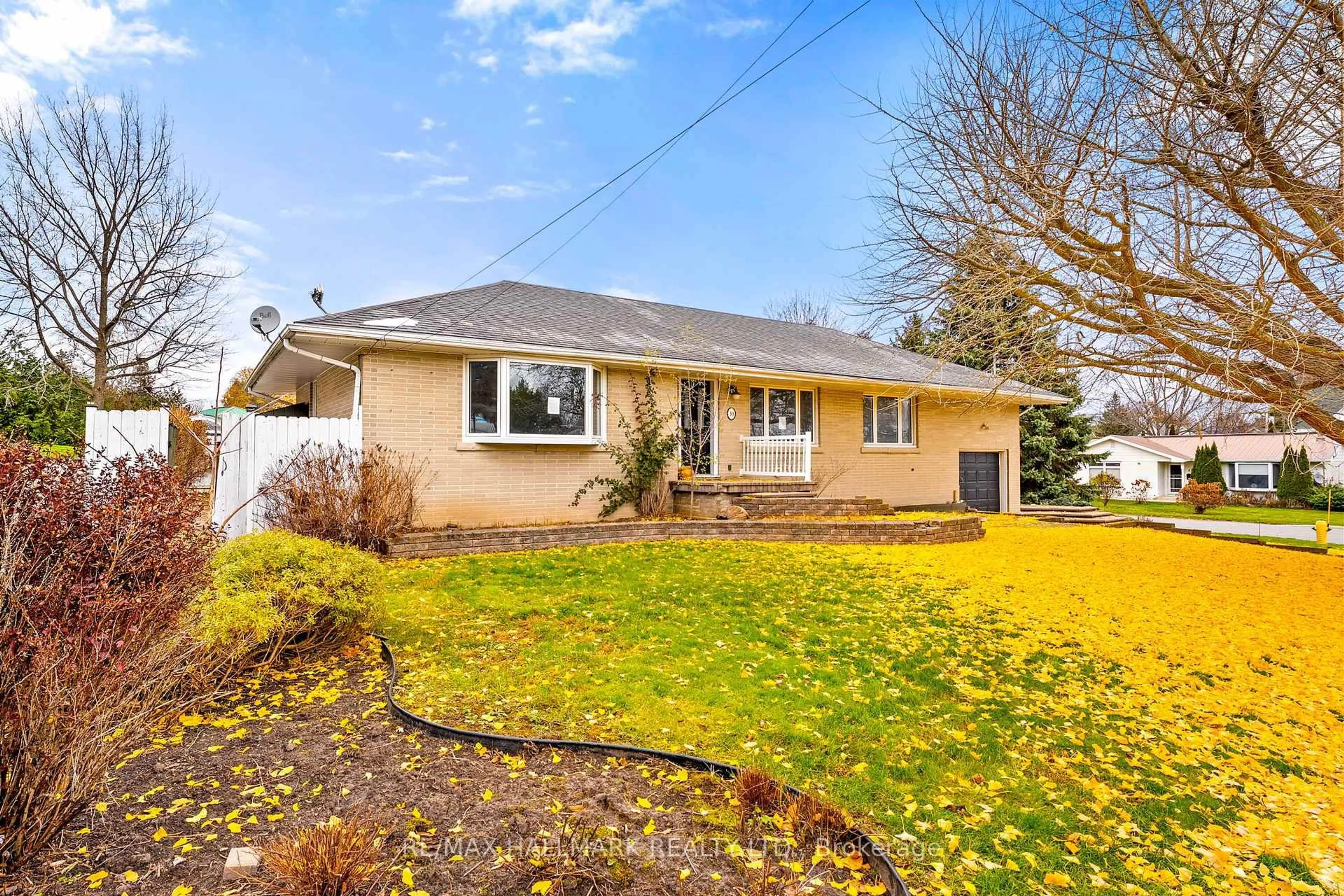 Home with vinyl exterior material, street for 10 Dorman St, Brighton Ontario K0K 1H0