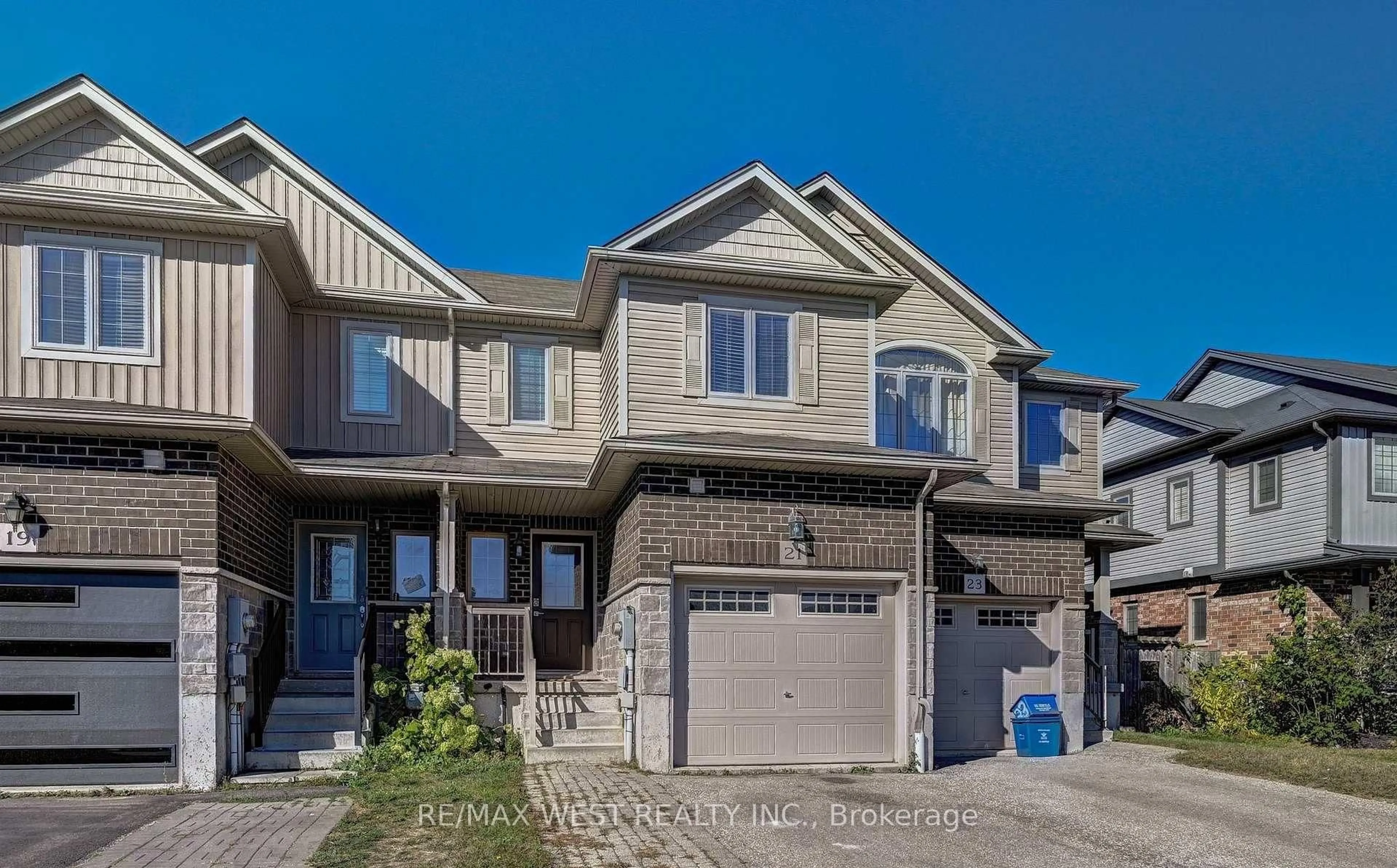 Home with brick exterior material, street for 21 Machado St, Kitchener Ontario N2R 0C1