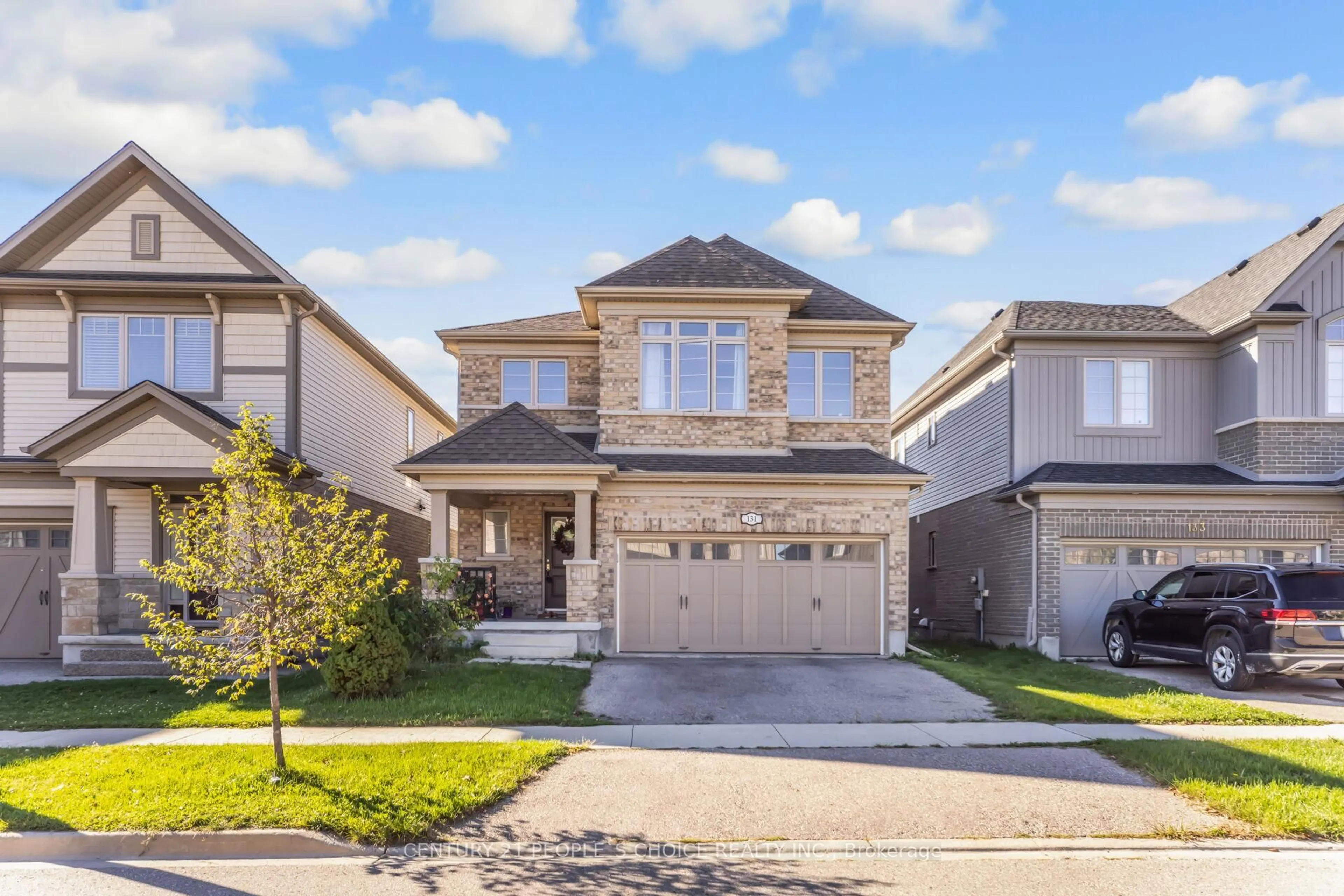 Home with brick exterior material, street for 131 Steeplechase Way, Waterloo Ontario N2K 0E7