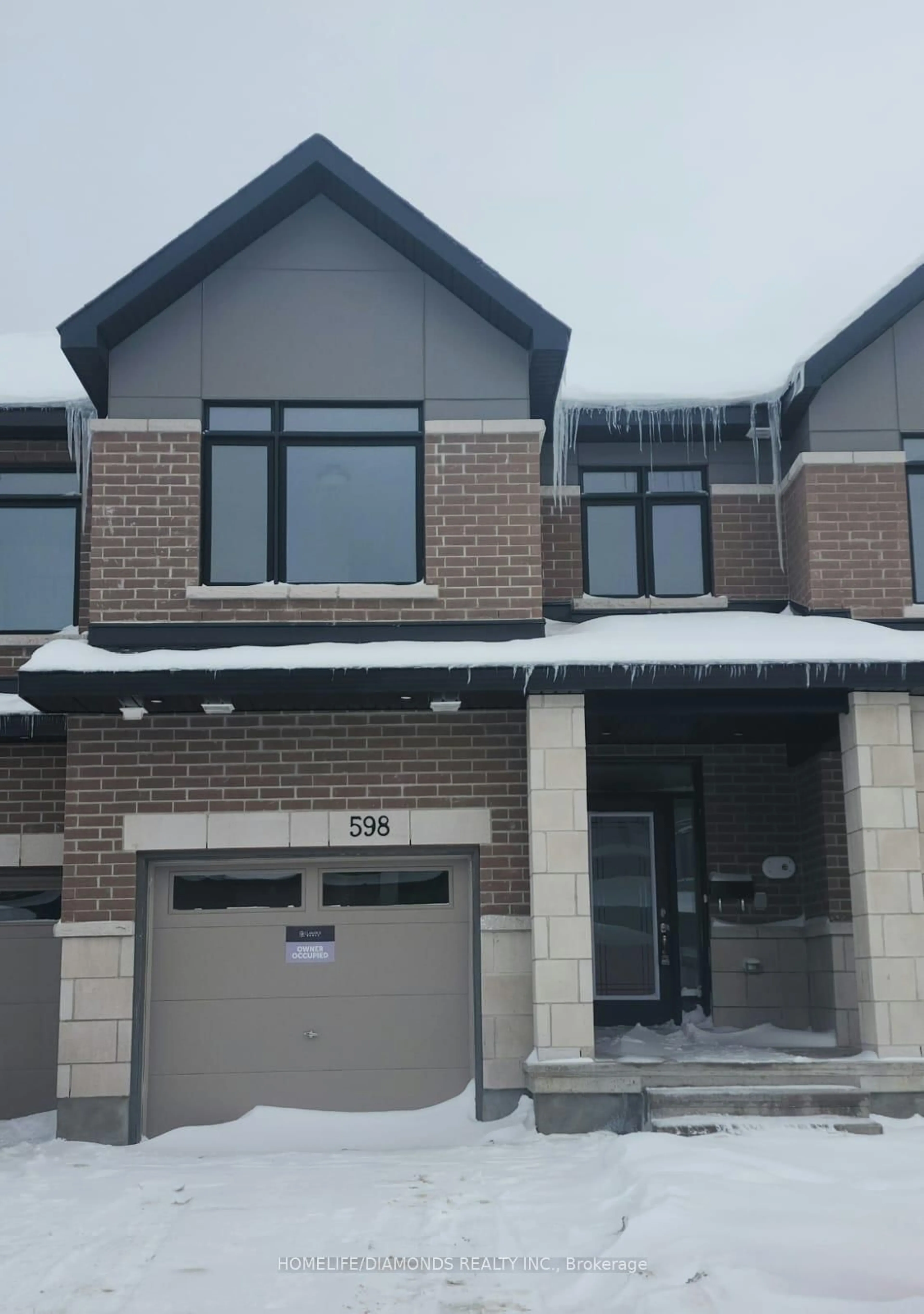 Home with brick exterior material, street for 598 Rathburn Lane, Ottawa Ontario K1T 0V2