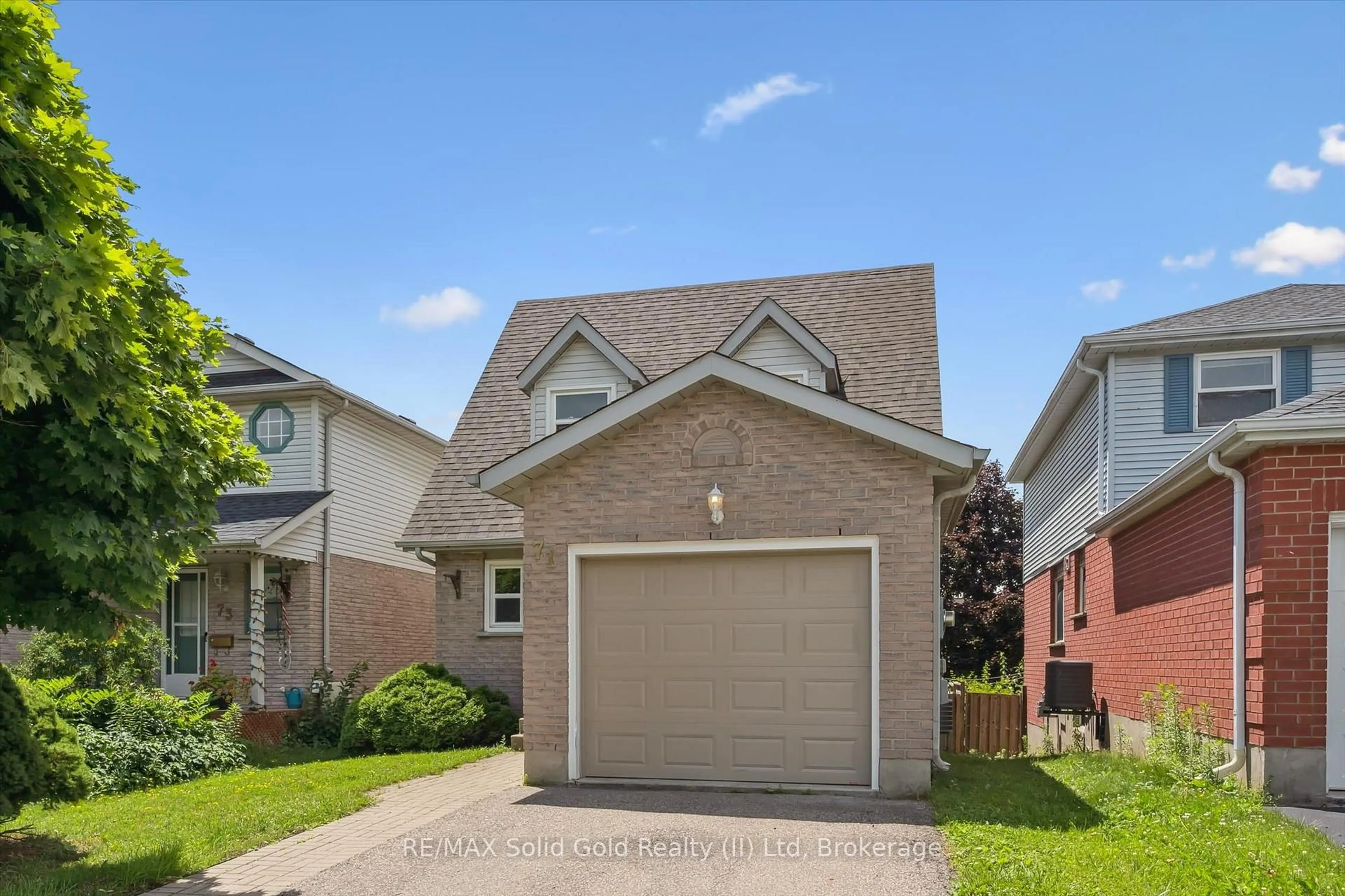 Home with brick exterior material, street for 71 Moss Pl, Guelph Ontario N1G 4V3