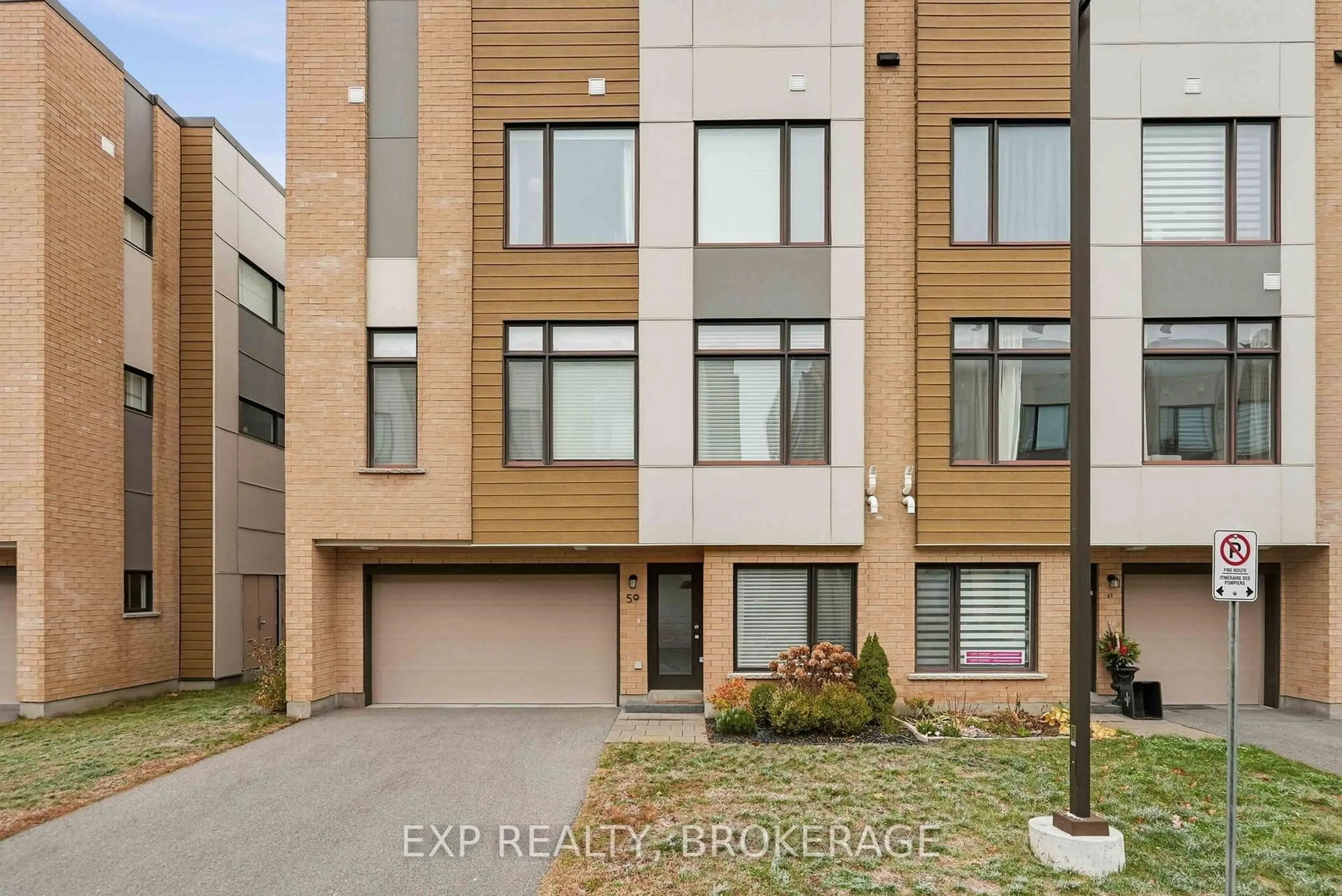 Home with brick exterior material, street for 59 Cherry Blossom Private, Ottawa Ontario K2H 0C4