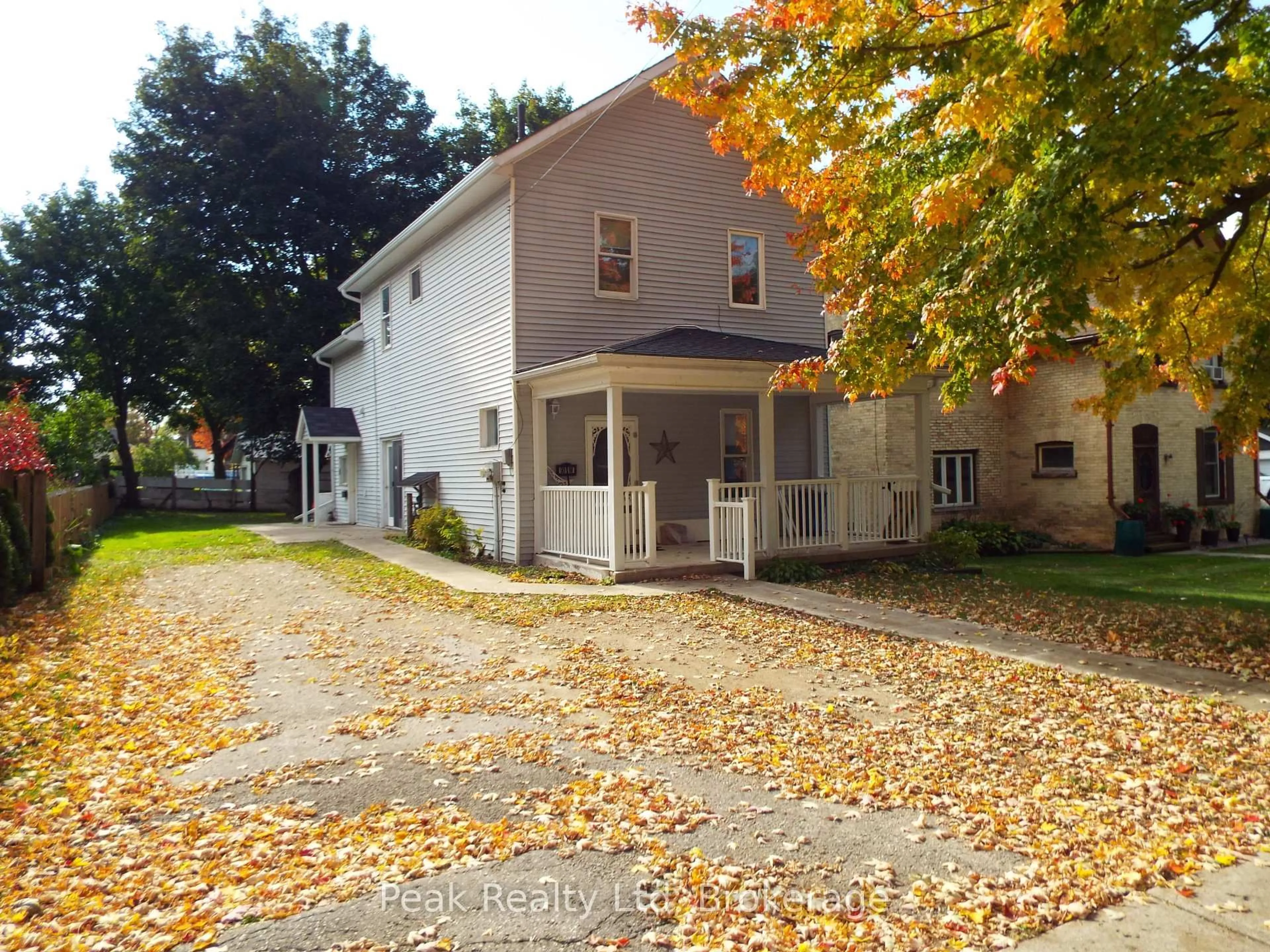 A pic from outside/outdoor area/front of a property/back of a property/a pic from drone, street for 90 John  St St, North Huron Ontario N0G 2W0