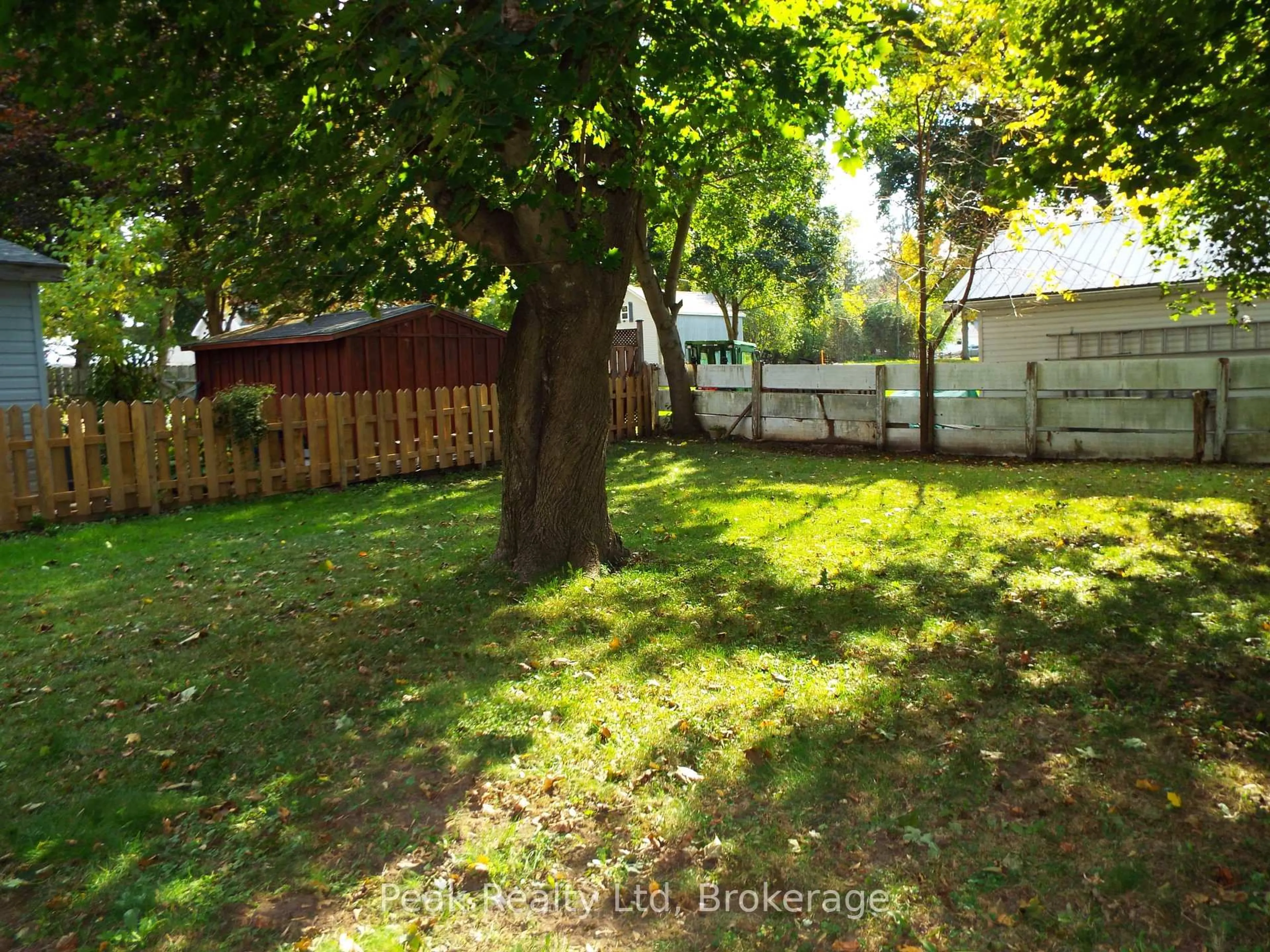 A pic from outside/outdoor area/front of a property/back of a property/a pic from drone, forest/trees view for 90 John  St St, North Huron Ontario N0G 2W0