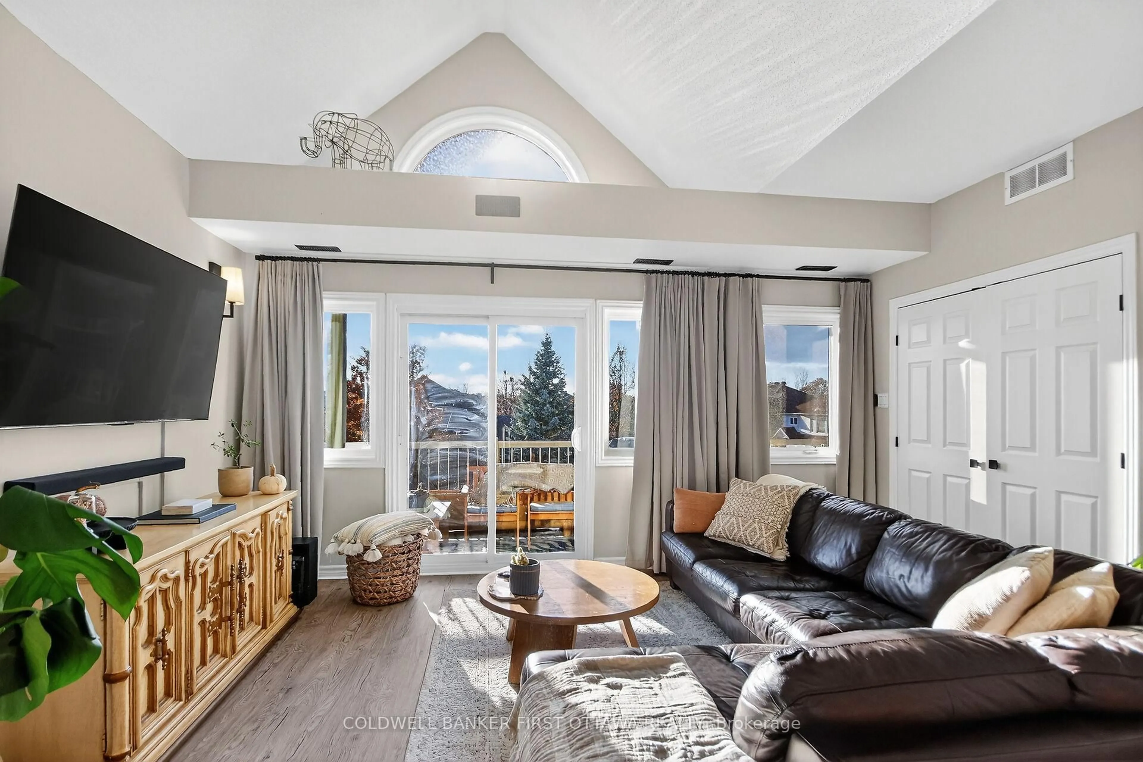 Living room with furniture, unknown for 137 Oldfield Dr #C, Ottawa Ontario K2G 7C8