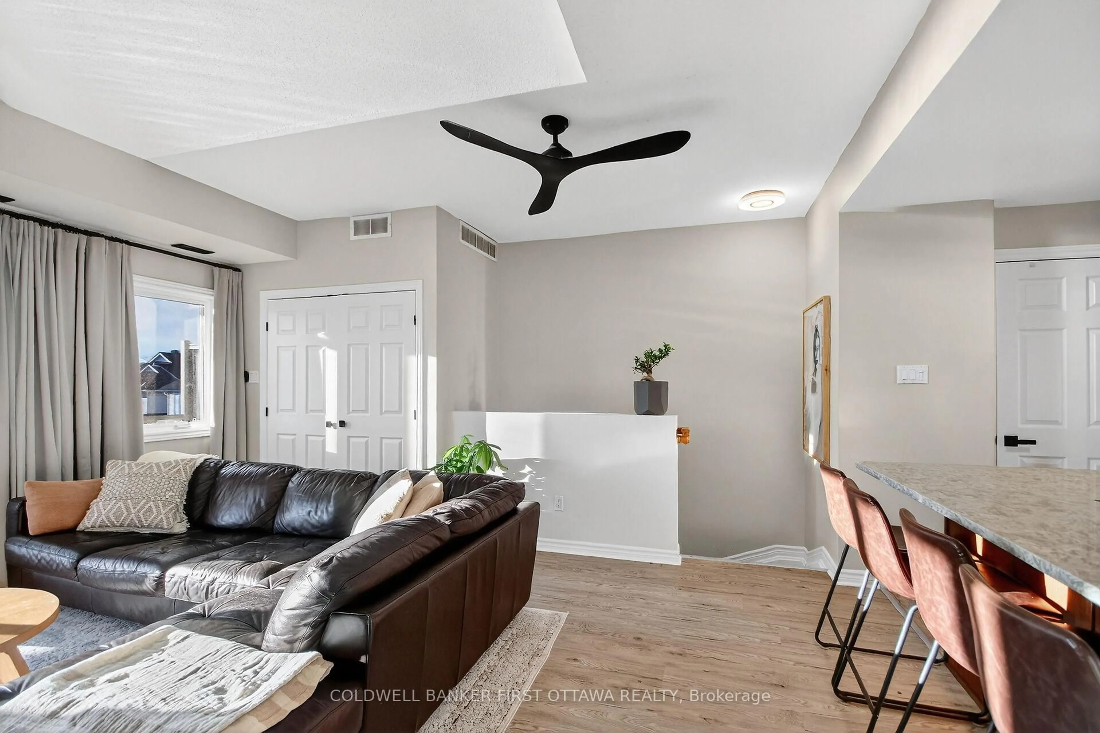 Living room with furniture, unknown for 137 Oldfield Dr #C, Ottawa Ontario K2G 7C8