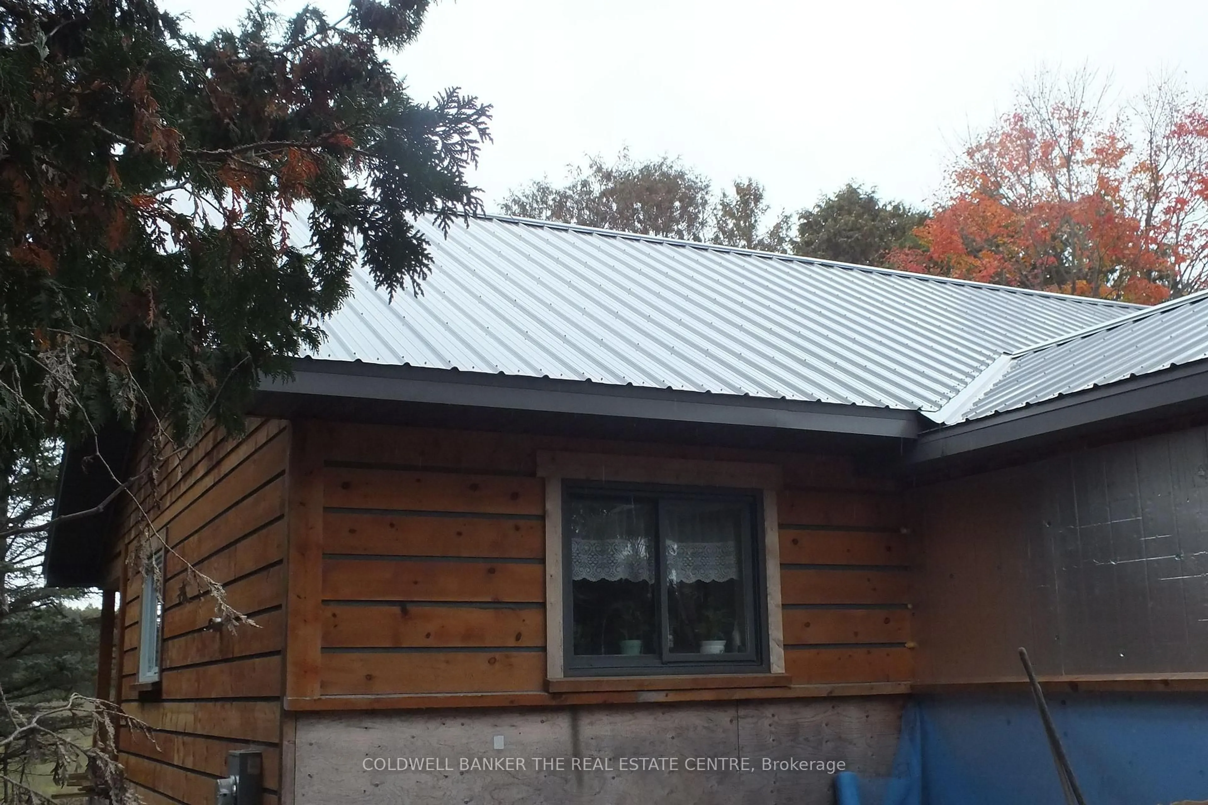 Home with vinyl exterior material, building for 59 Highway 542 Highway, Central Manitoulin Ontario P0P 2C0