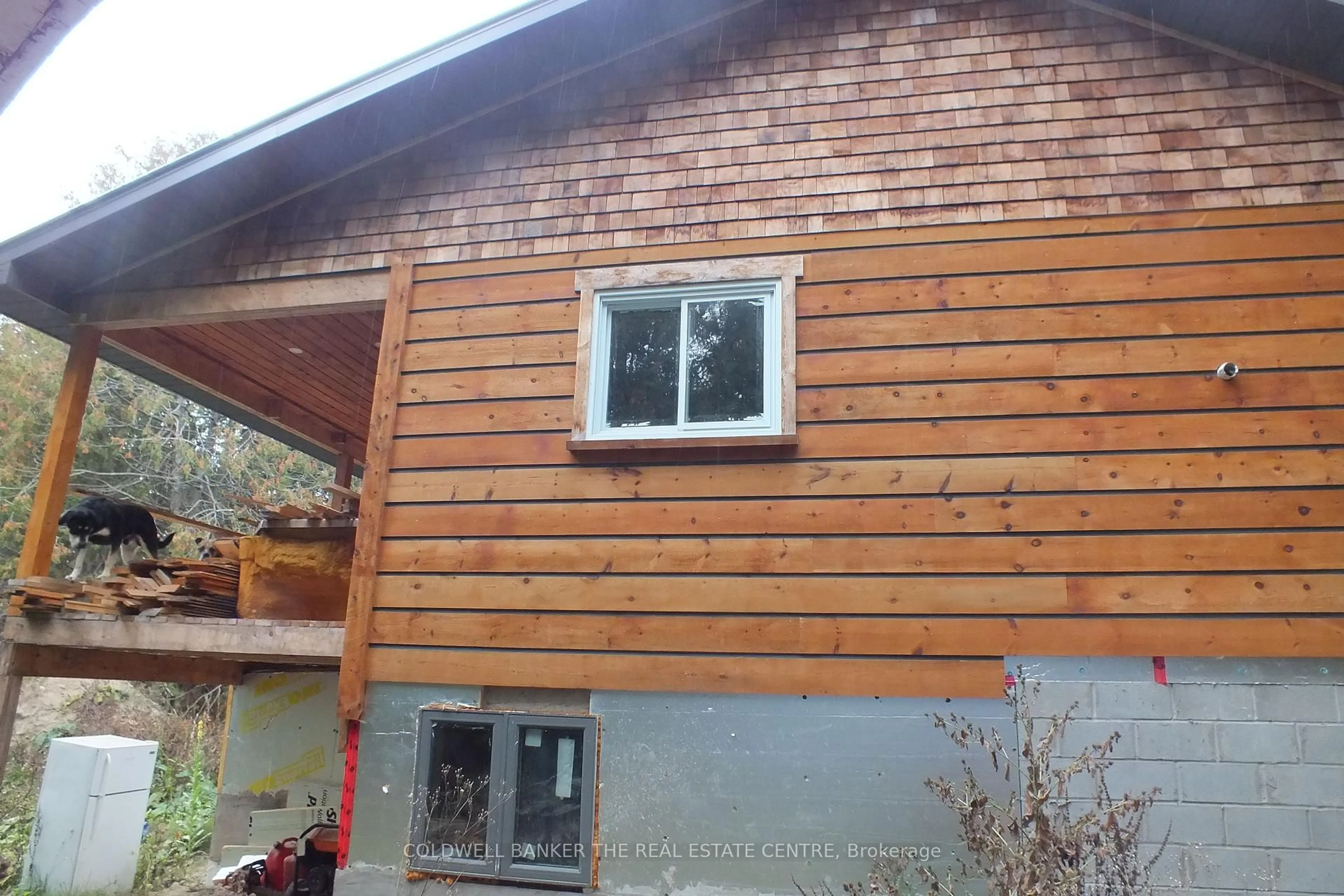 Home with vinyl exterior material, building for 59 Highway 542 Highway, Central Manitoulin Ontario P0P 2C0