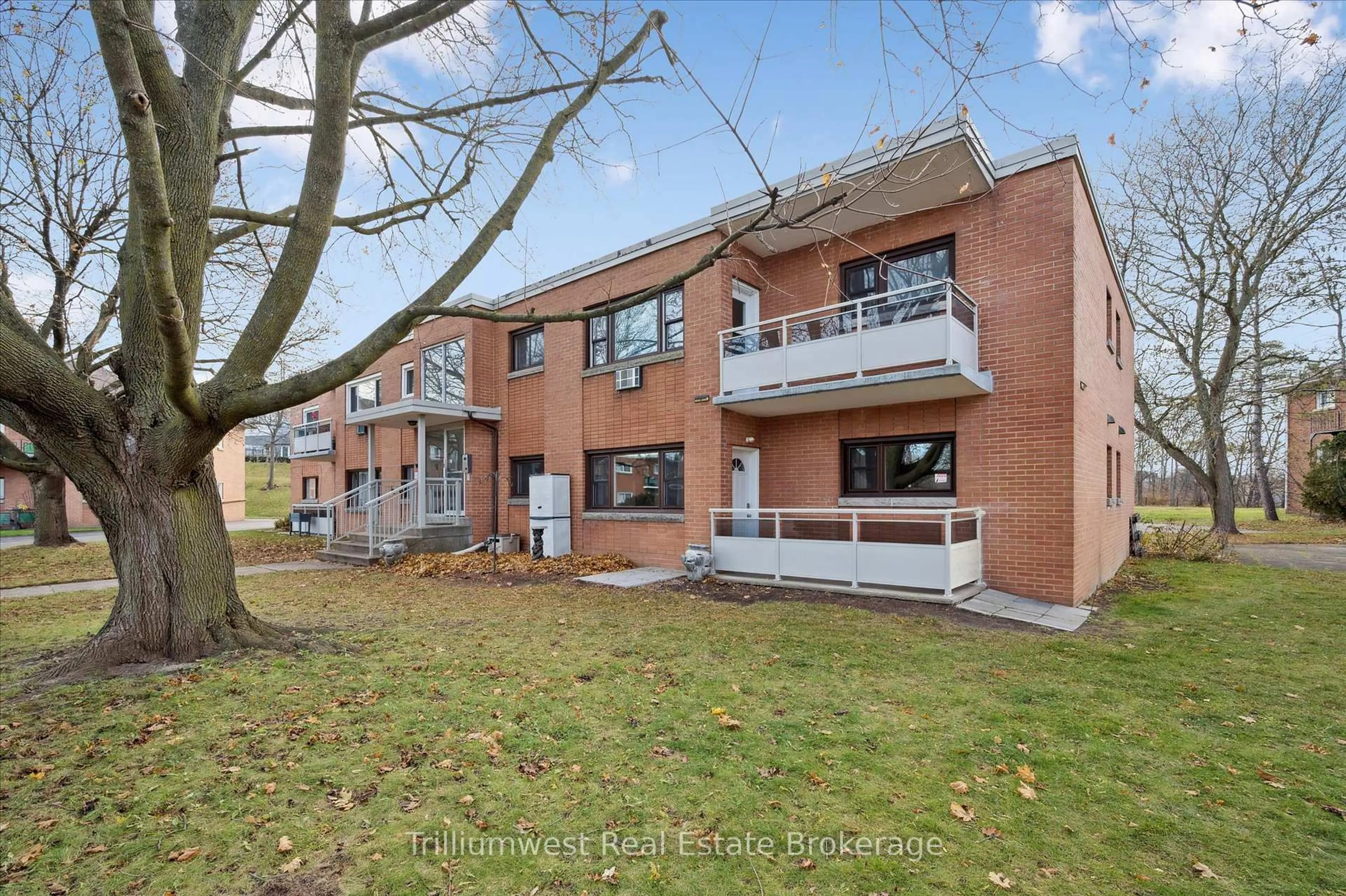 Home with brick exterior material, street for 1 Sunnylea Cres #2, Guelph Ontario N1E 1W1