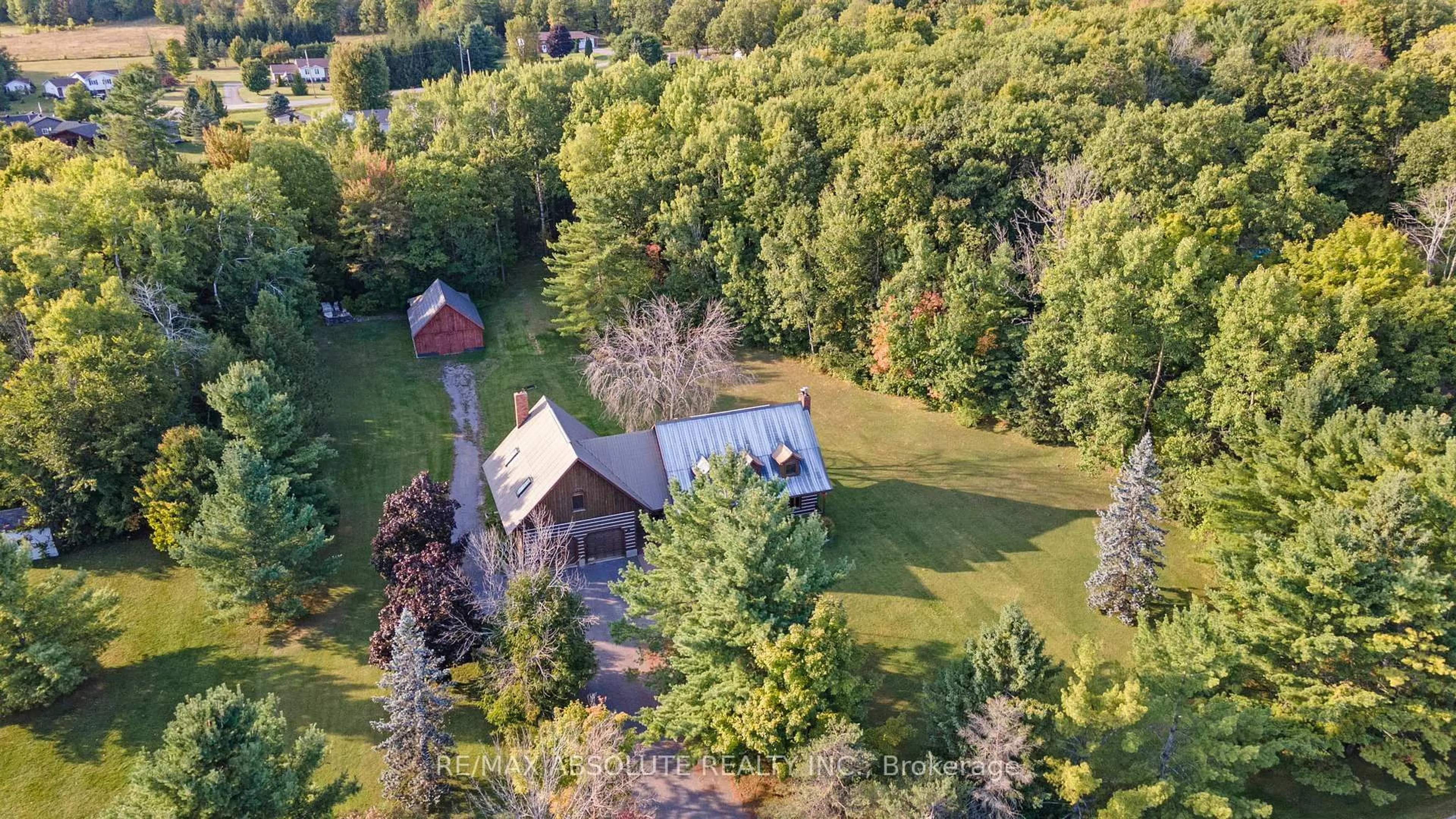 A pic from outside/outdoor area/front of a property/back of a property/a pic from drone, forest/trees view for 188 Burns Dr, Braeside Ontario K0A 1G0